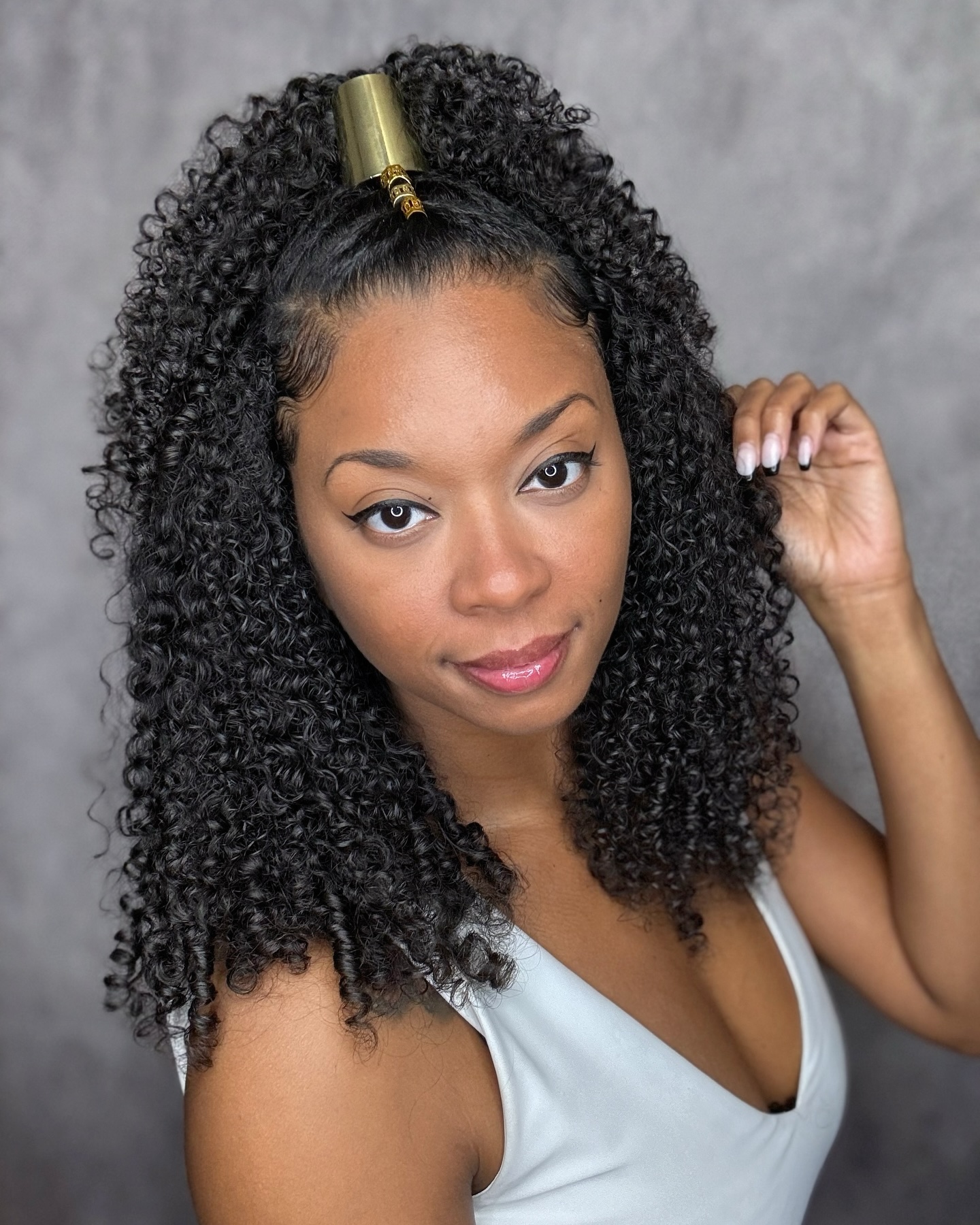 Luxurious Deep-Curl Half-Updo with Golden Clip
