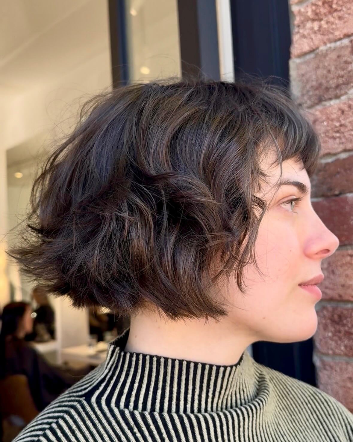Modern Textured French Bob with Playful Curls