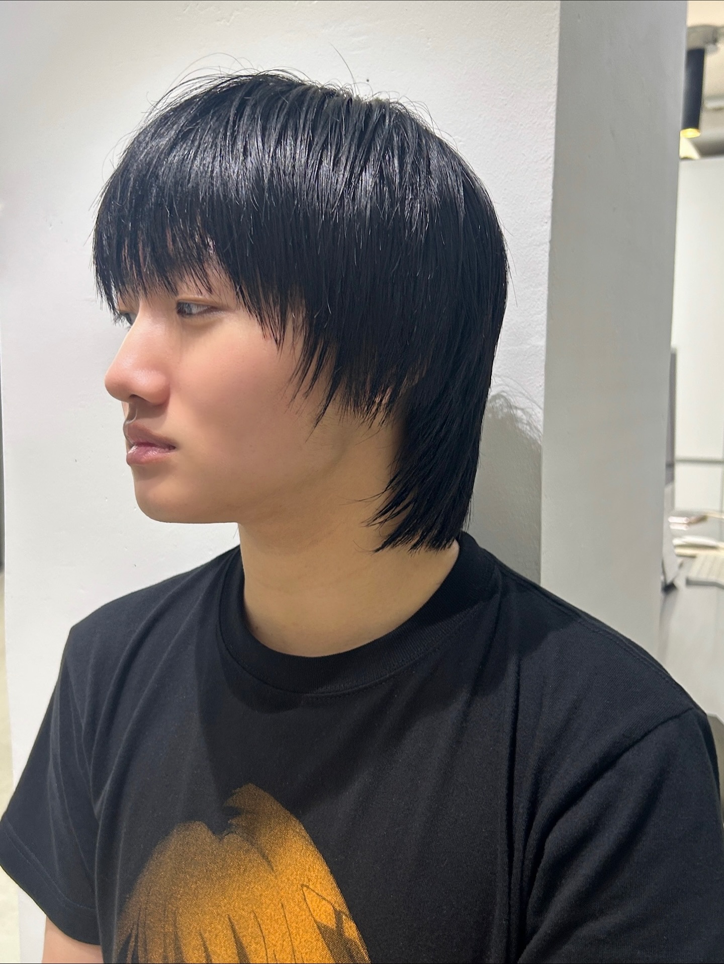 Sleek Jet-Black Bob with Textured Bangs