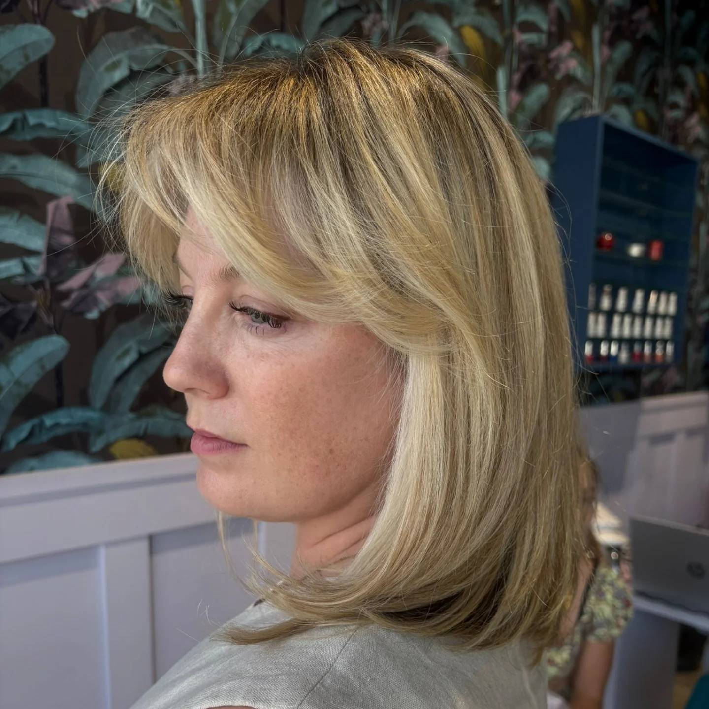 Softly Layered Blonde Bob with Wispy Bangs