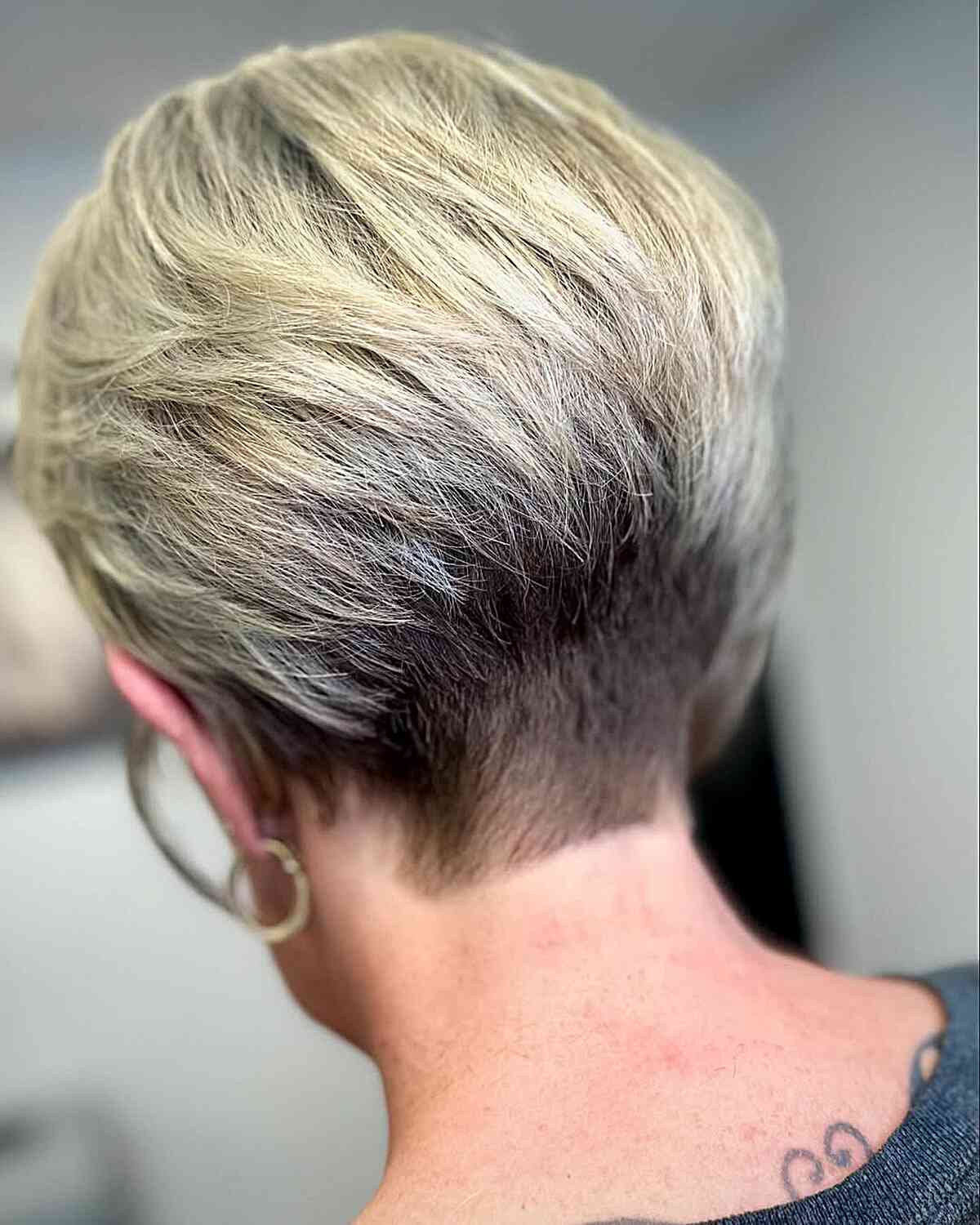 Stylish Short Pixie Cut with Gray Highlights
