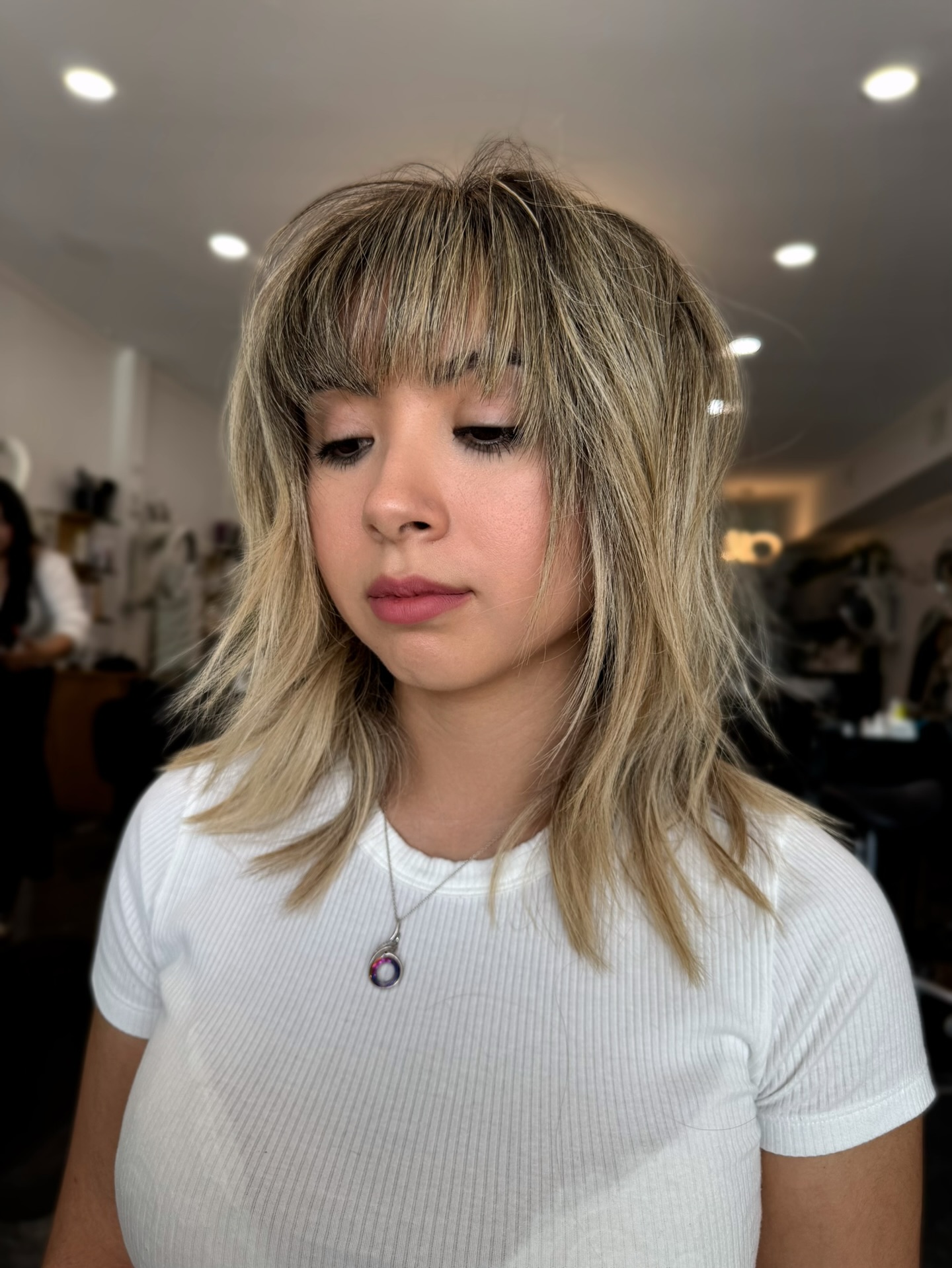 Textured Blonde Shag with Peek-a-Boo Bangs