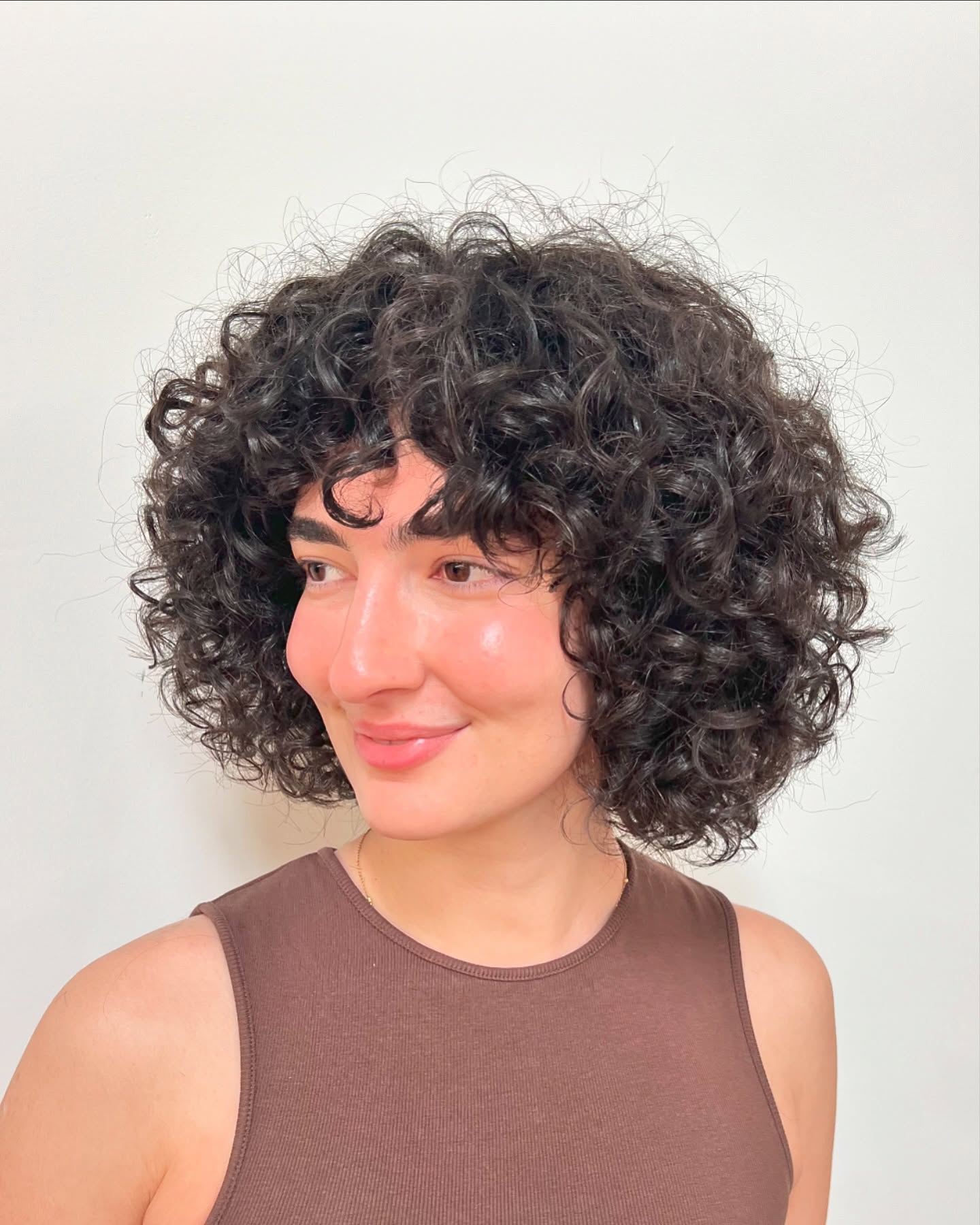 Textured Curly Bob with Playful Bangs