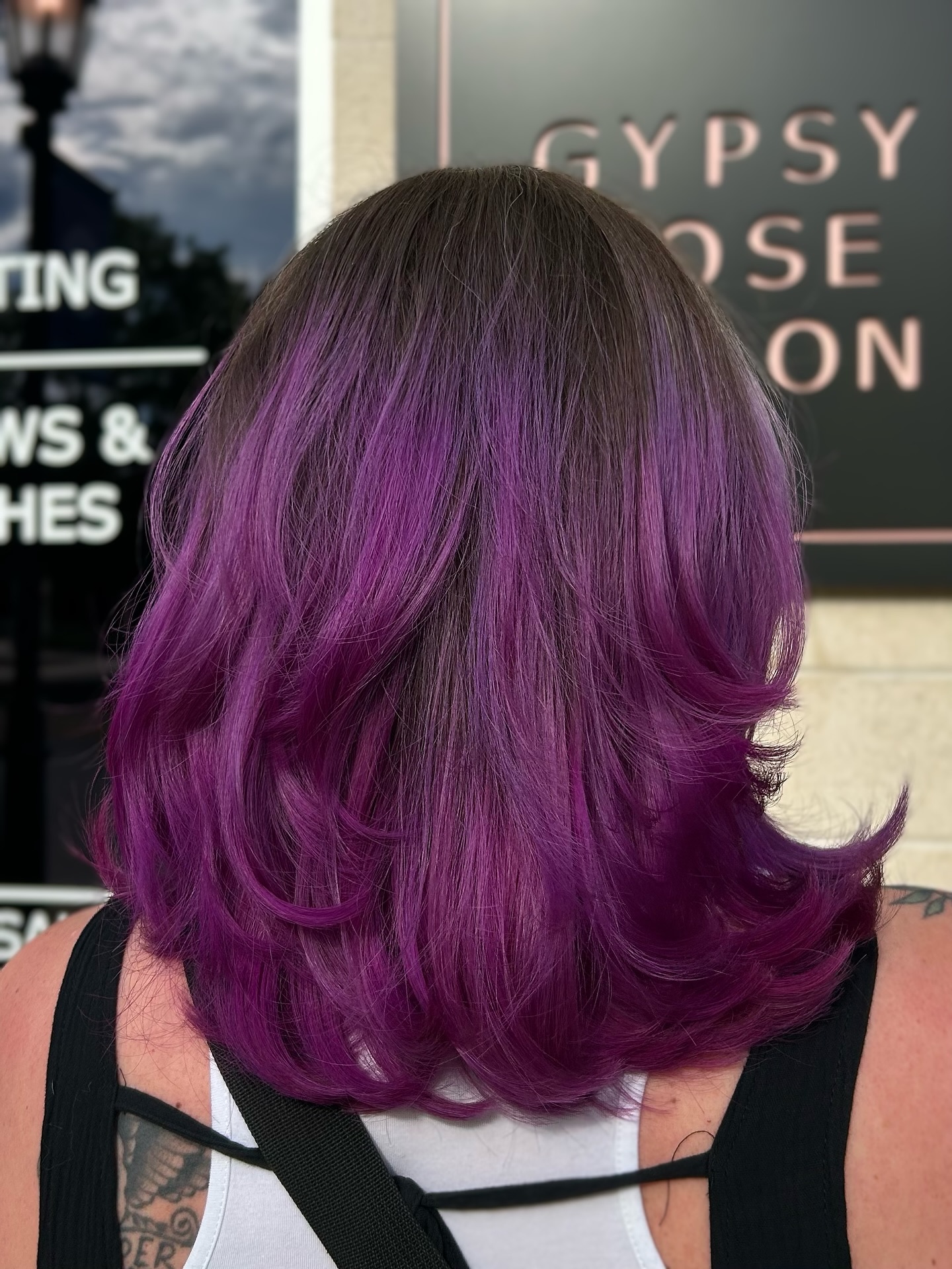 Bold Mid-Length Hair with Vibrant Purple Ombre