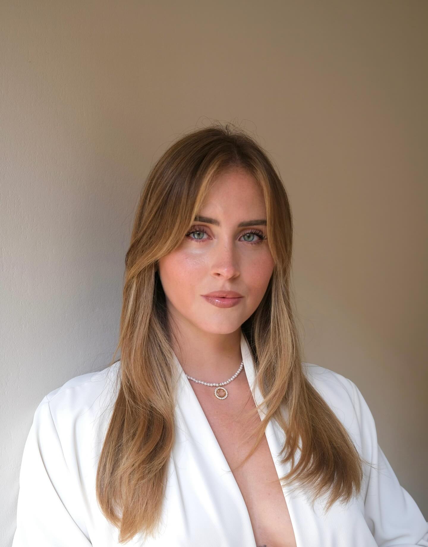 Breezy Blonde Layers with Soft Side-Swept Bangs