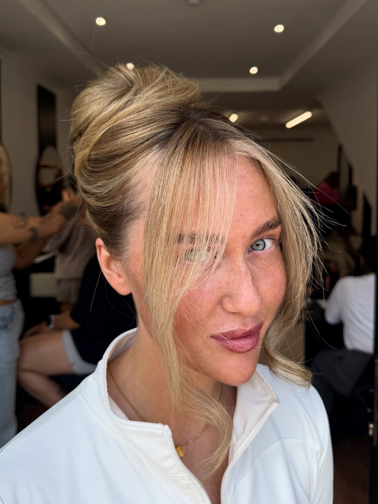 Effortlessly Chic Blonde Tousled Updo