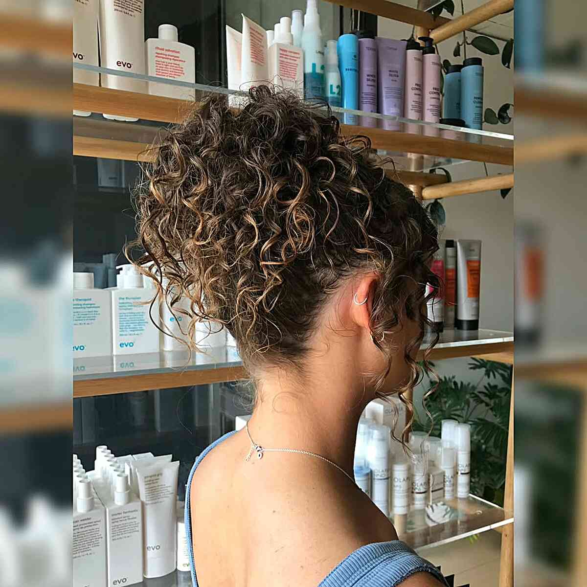 Elegant Curly Updo with Volume