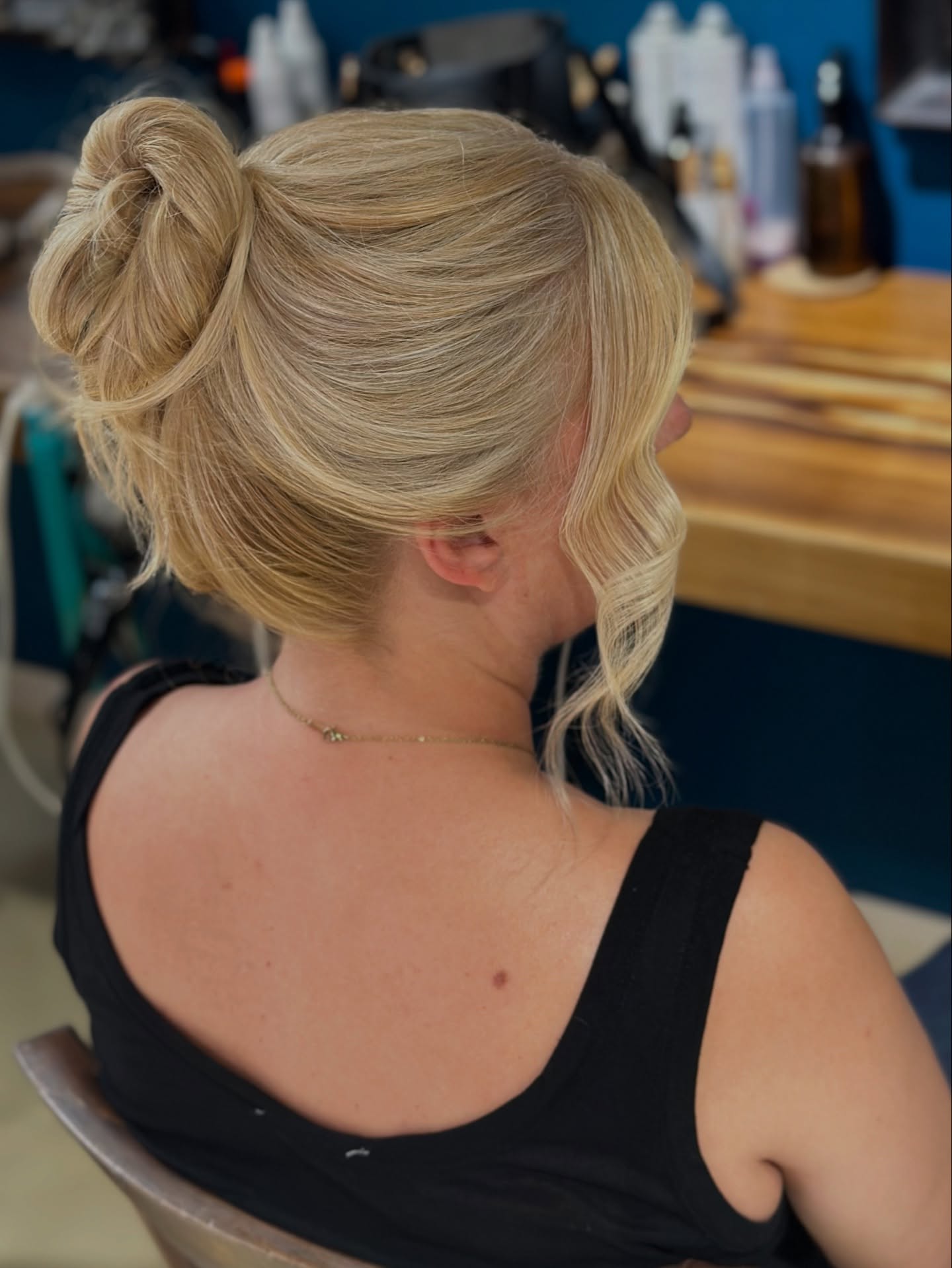 Light Blonde Tousled Updo with Soft Waves