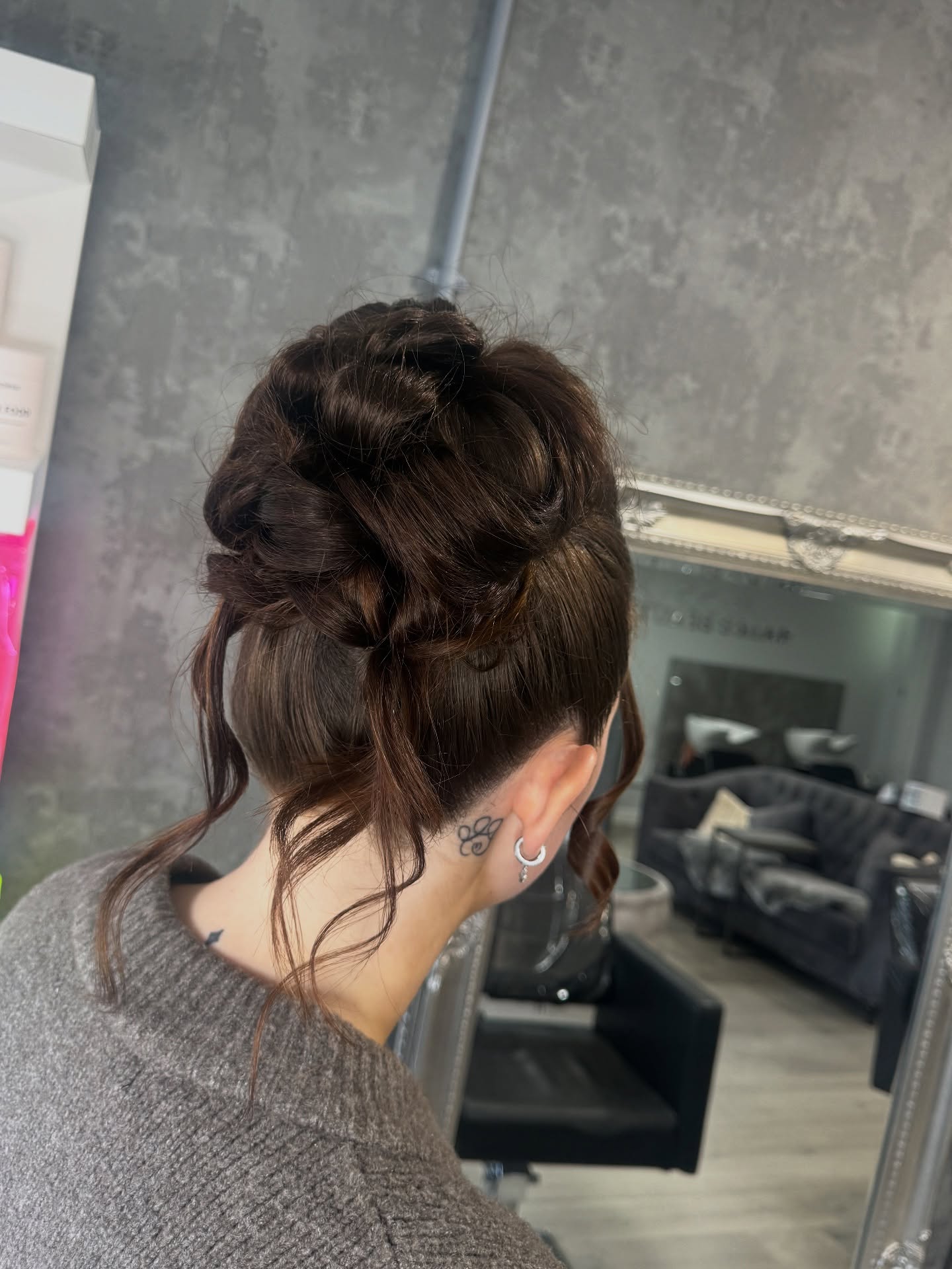 Refined Multi-Threaded Chignon with Delicate Wisps