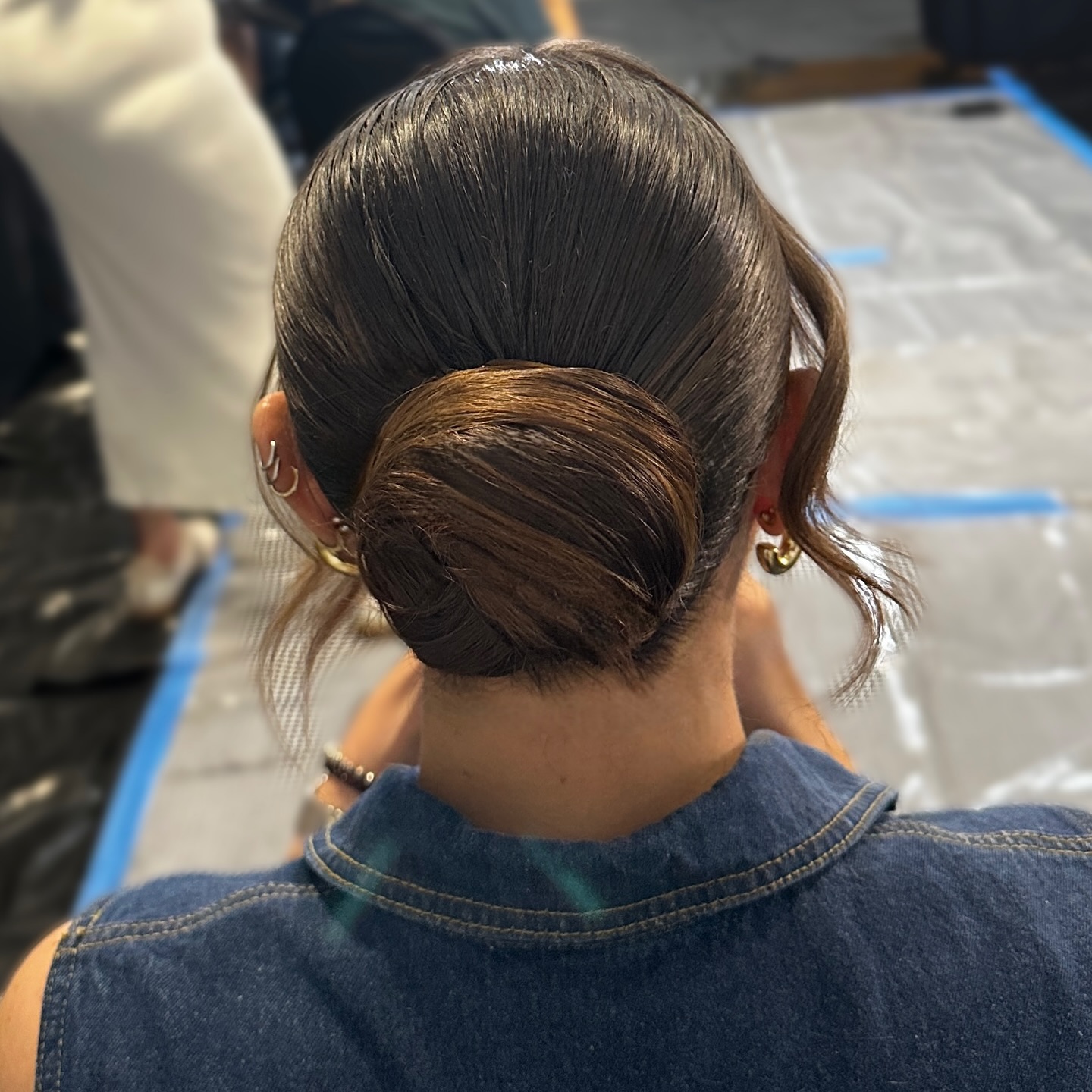 Sleek Classic Low Bun with Elegant Gloss Finish