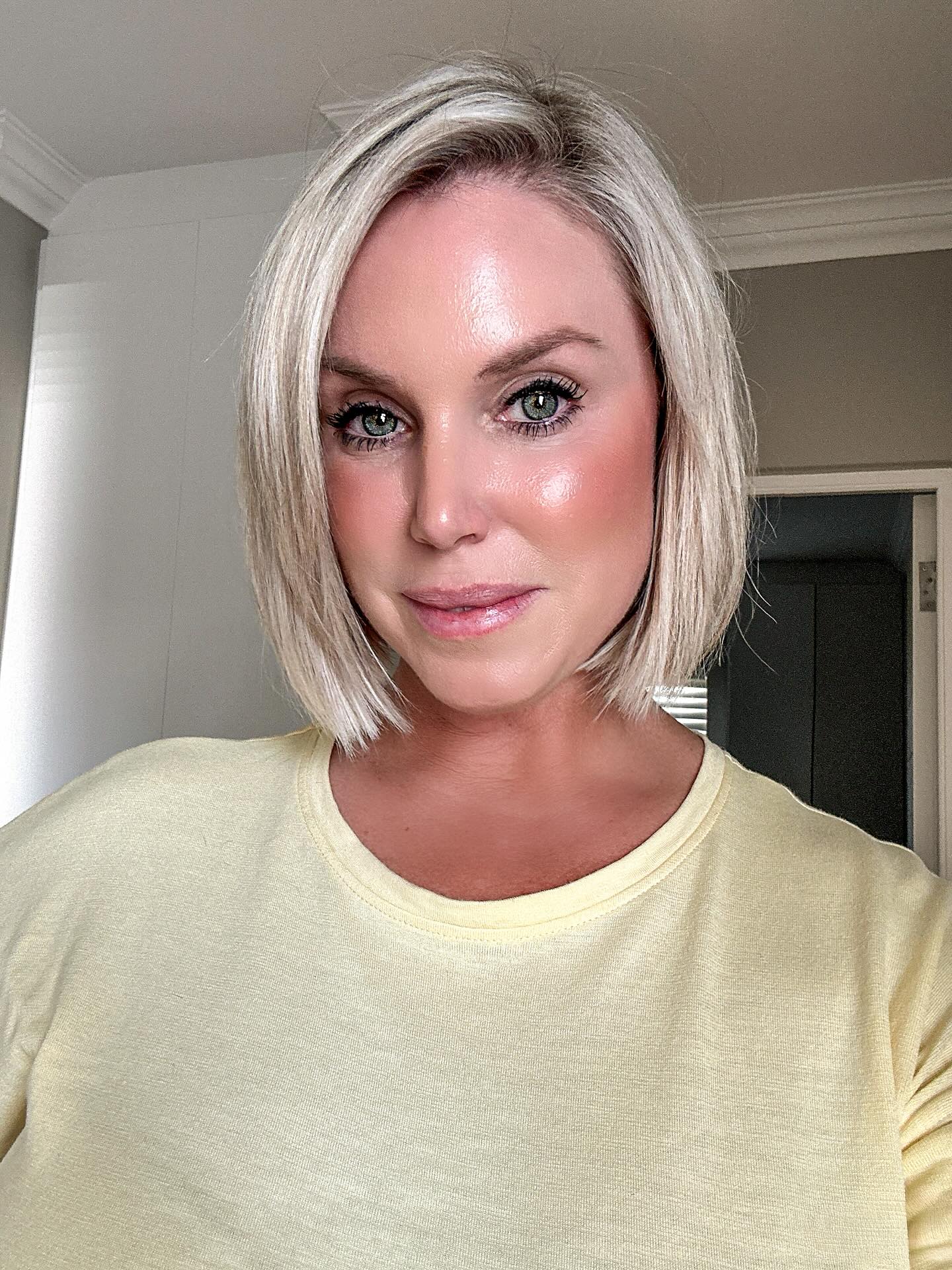 Sleek Platinum Blonde Bob with Textured Ends