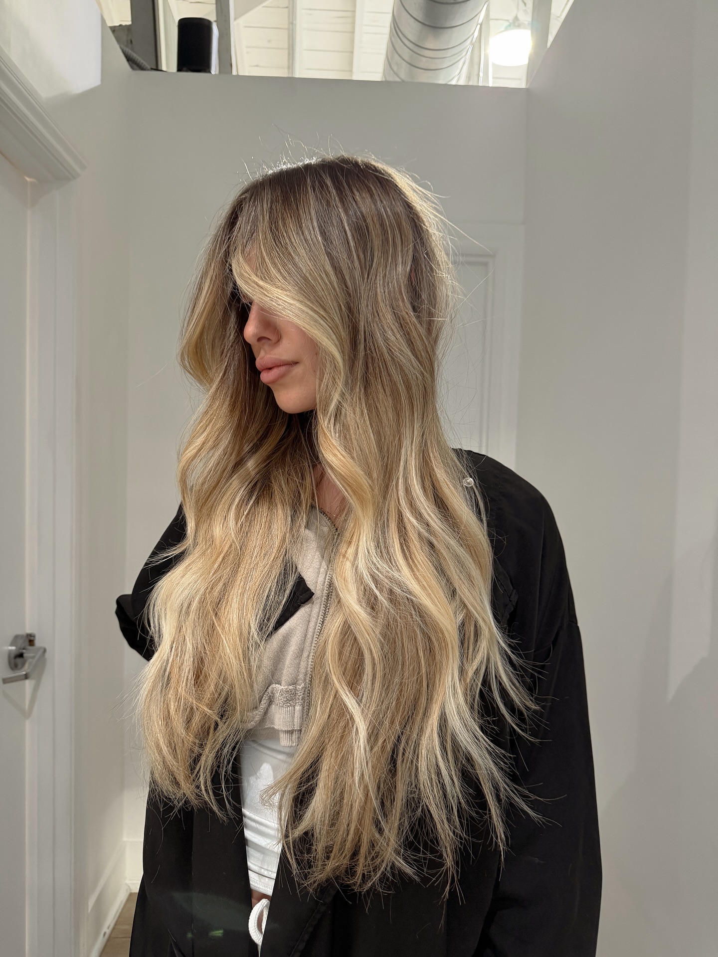 Sun-Kissed Cascading Blonde Waves