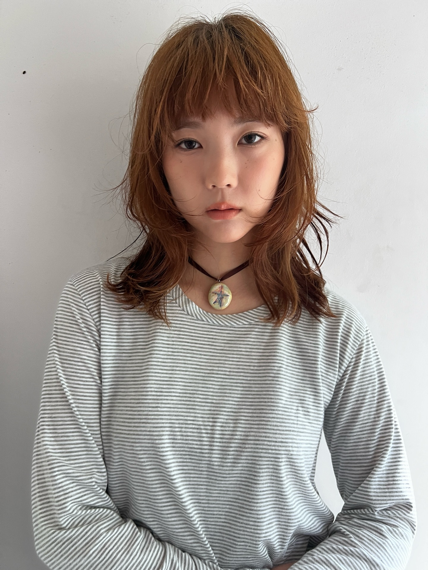 Textured Copper Bob with Swooping Bangs