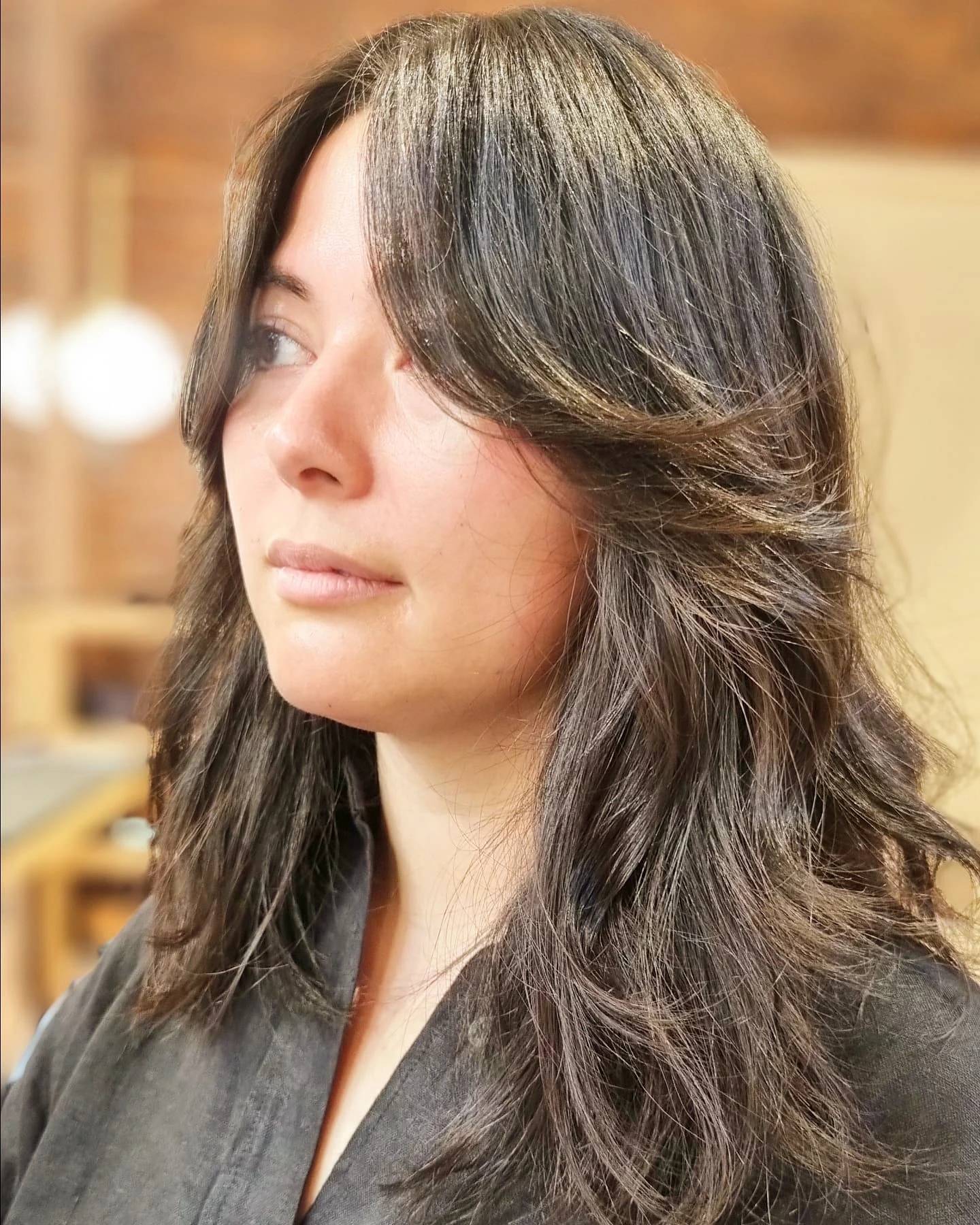 Textured Mid-Length Cut with Subtle Face-Framing Layers