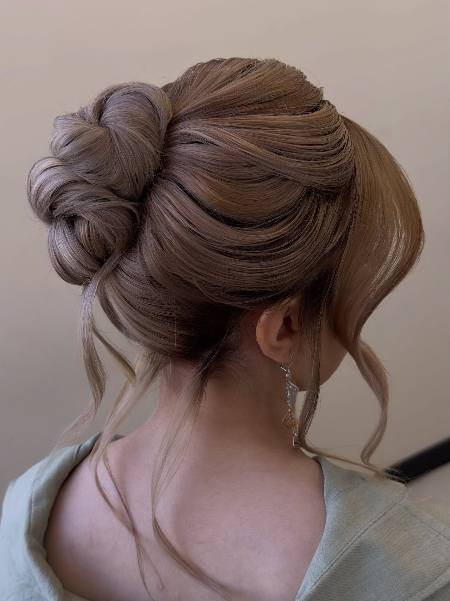 Twisted Elegance Bun with Subtle Layered Strands
