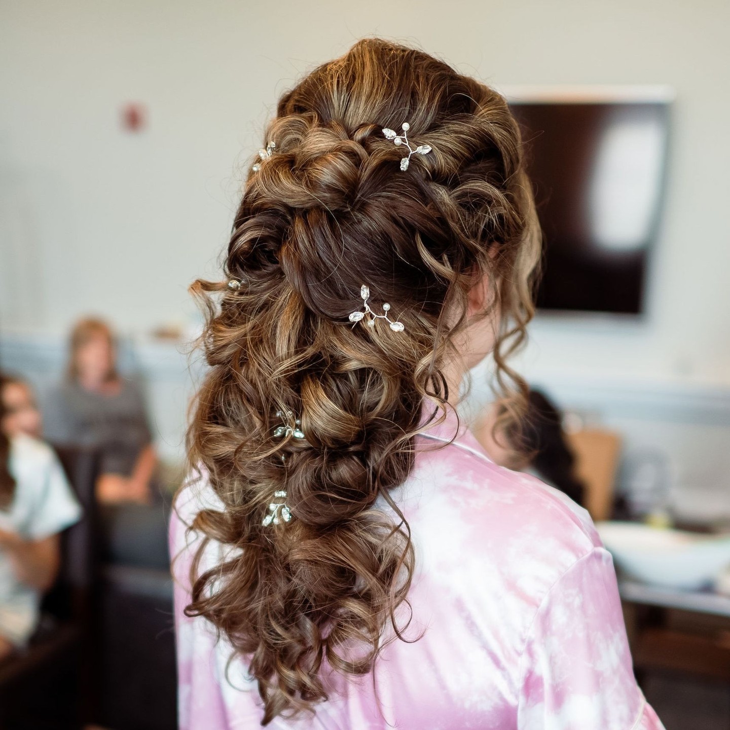 Whimsical Curled Updo with Silver Floral Clips