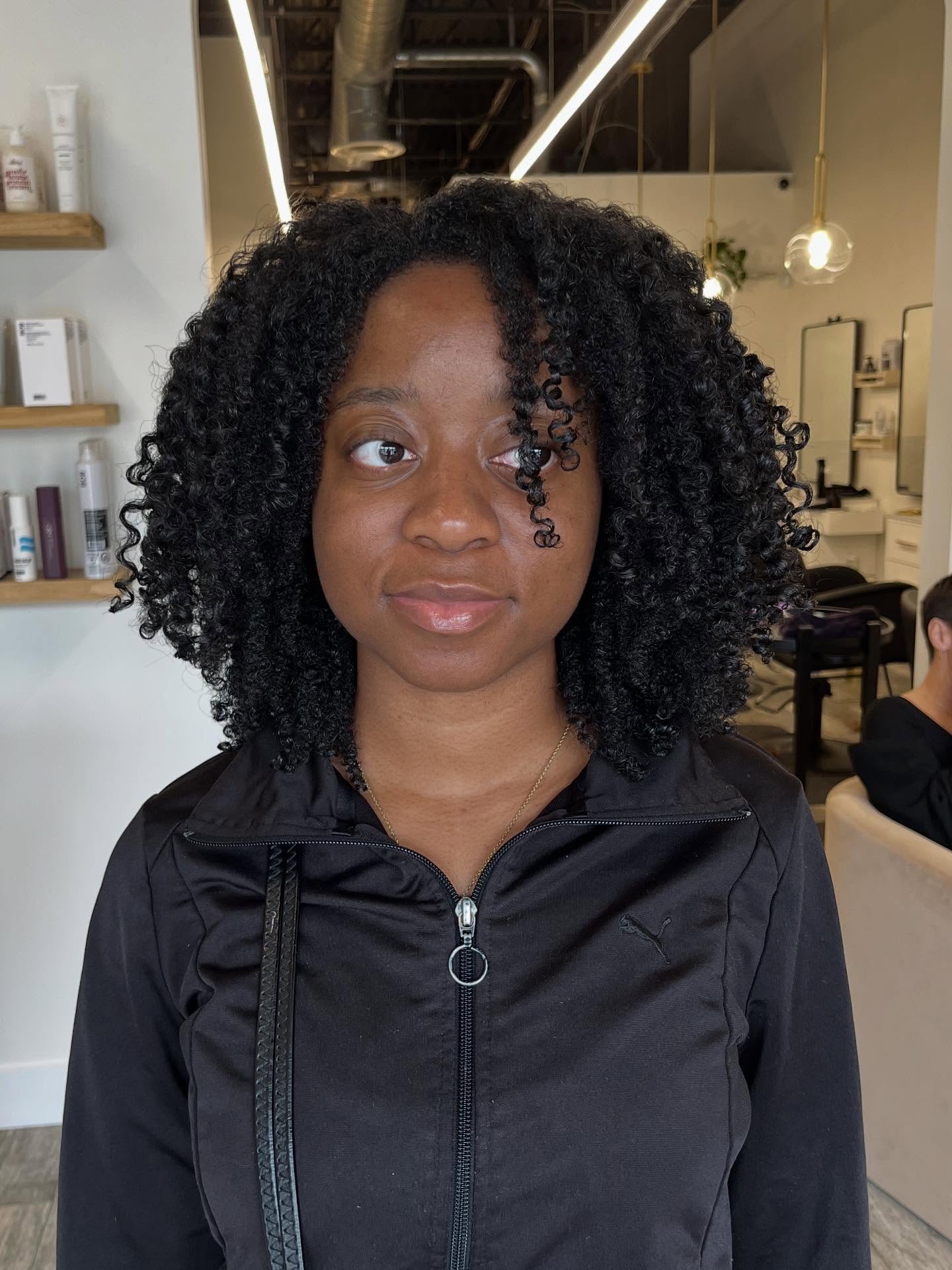 Bouncy Curly Volume with Face-Framing Definition