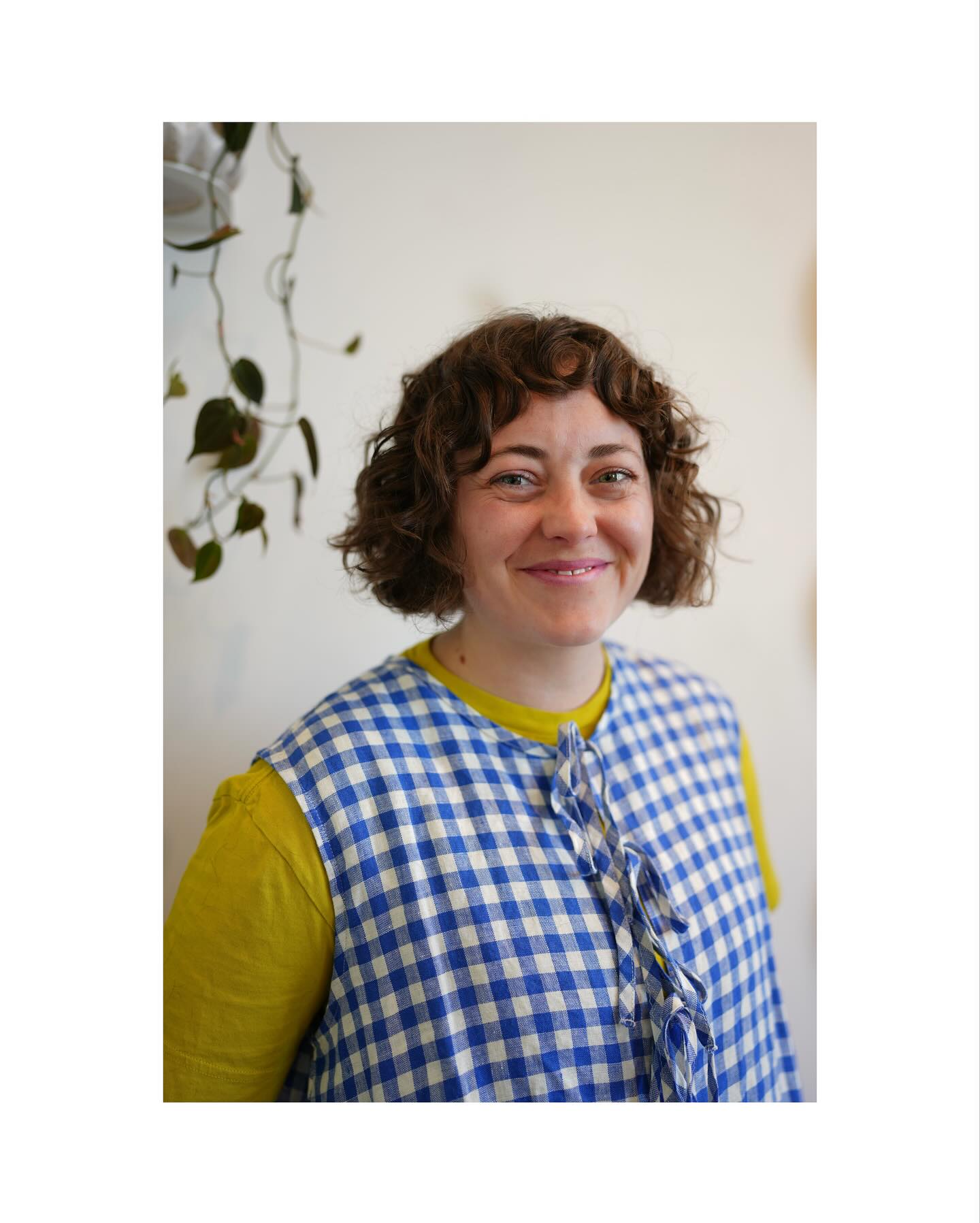 Chic Curly Bob with Soft Bangs