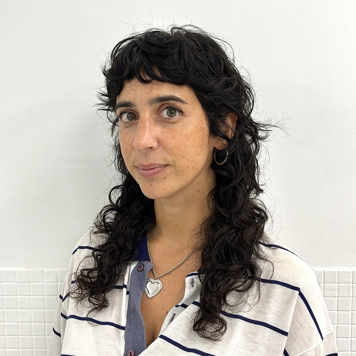 Chic Curly Shag with Defined Bangs