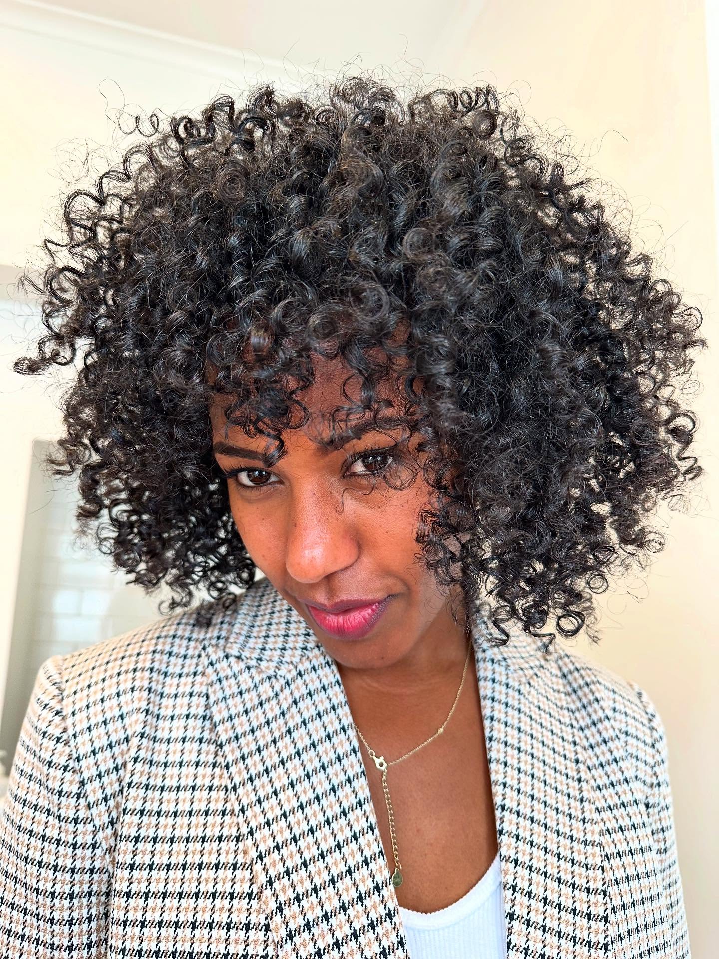 Chic Ebony Curls with Tapered Volume