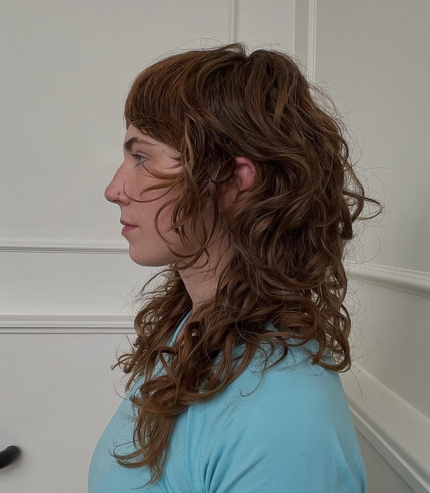 Curly Layered Shag with Bold Fringe