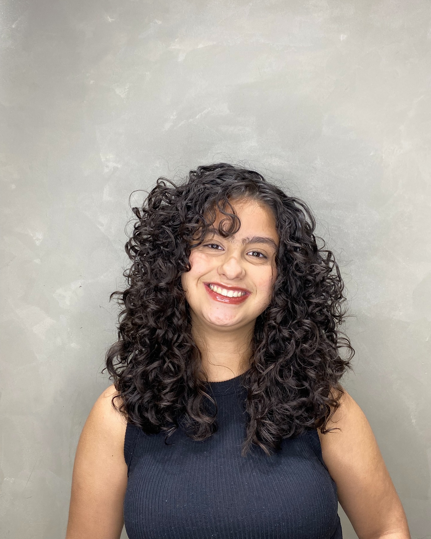 Dynamic Curly Wolf Cut with Lively Texture