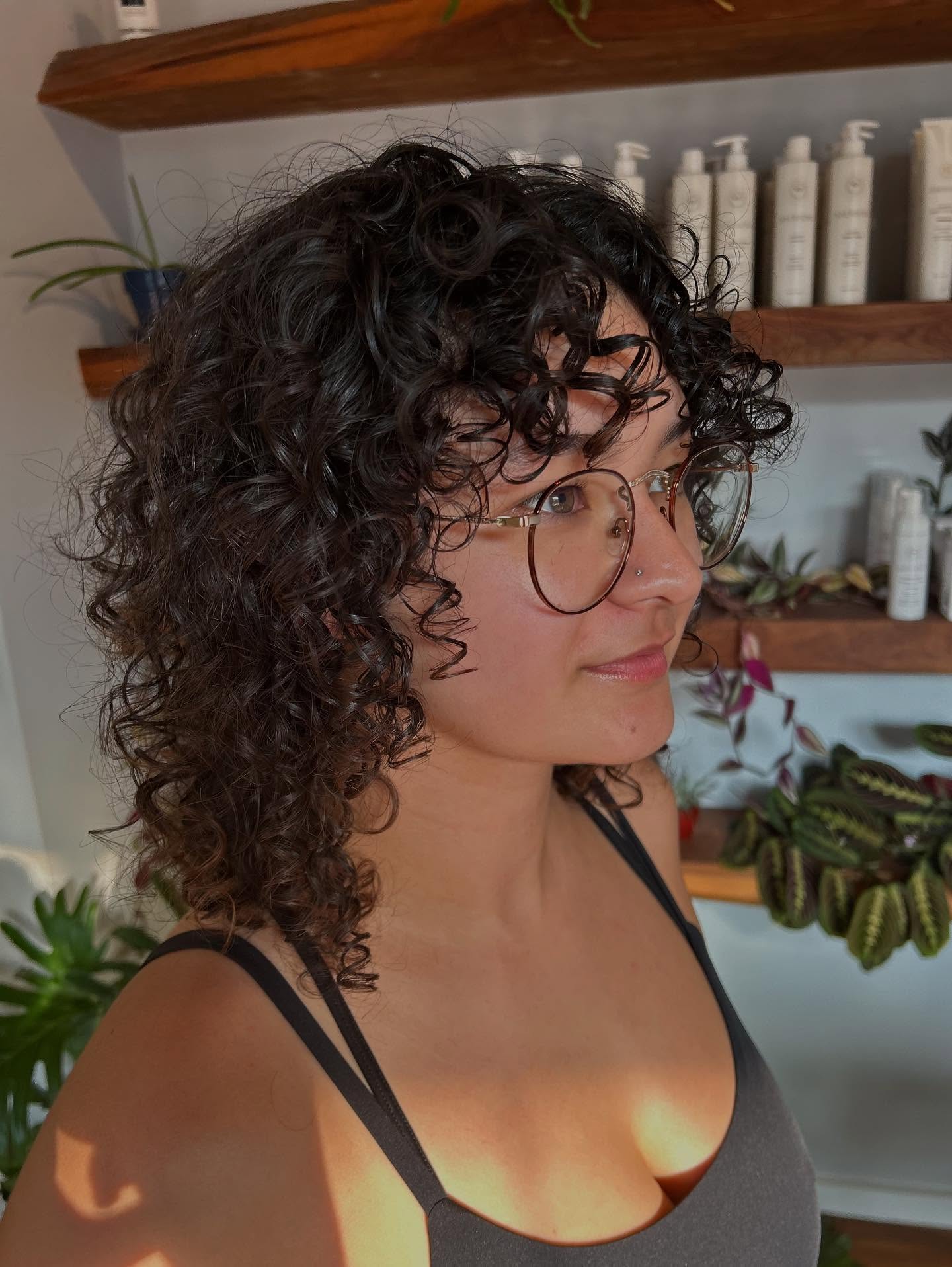 Dynamic Curly Wolf Cut with Lively Volume