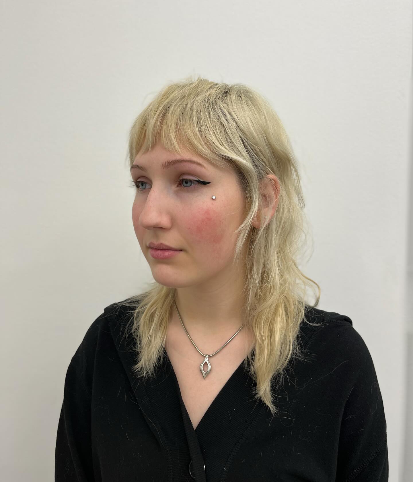 Edgy Choppy Shag with Soft Bangs