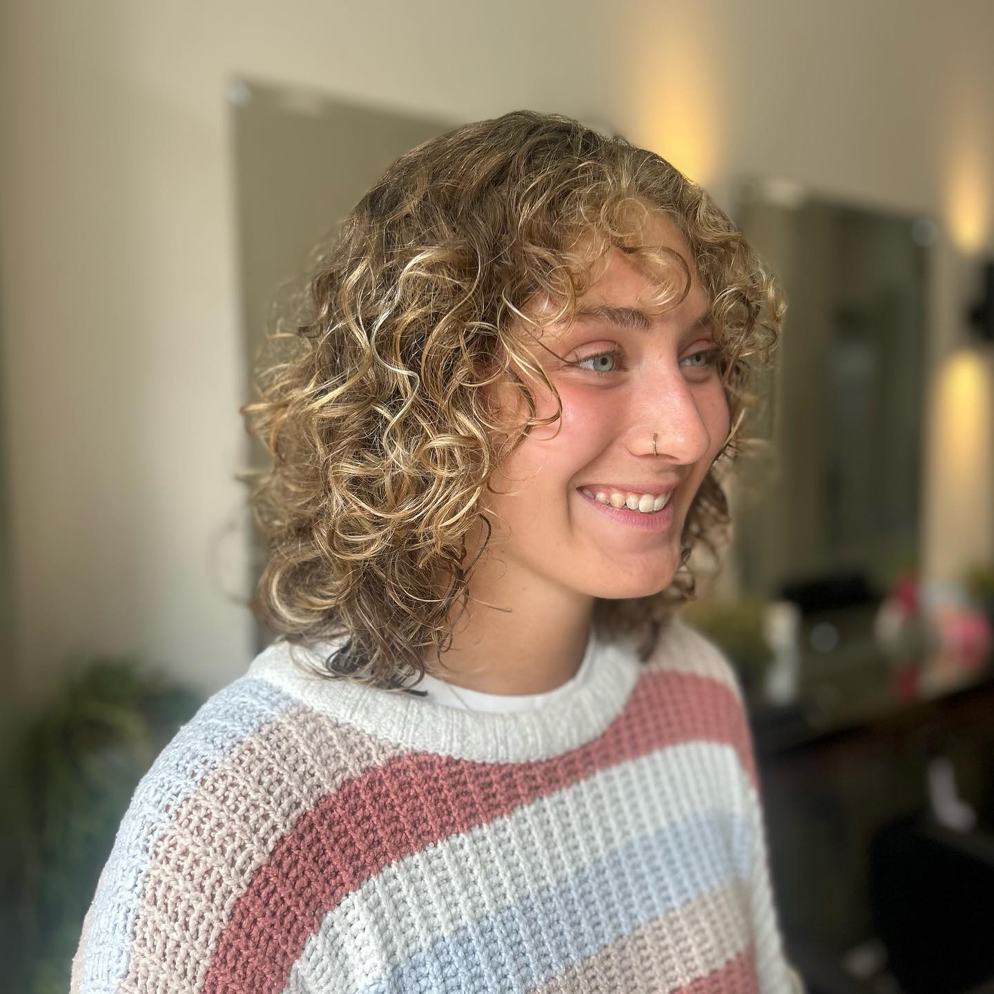 Effortlessly Soft Spiral Curls with Natural Highlights