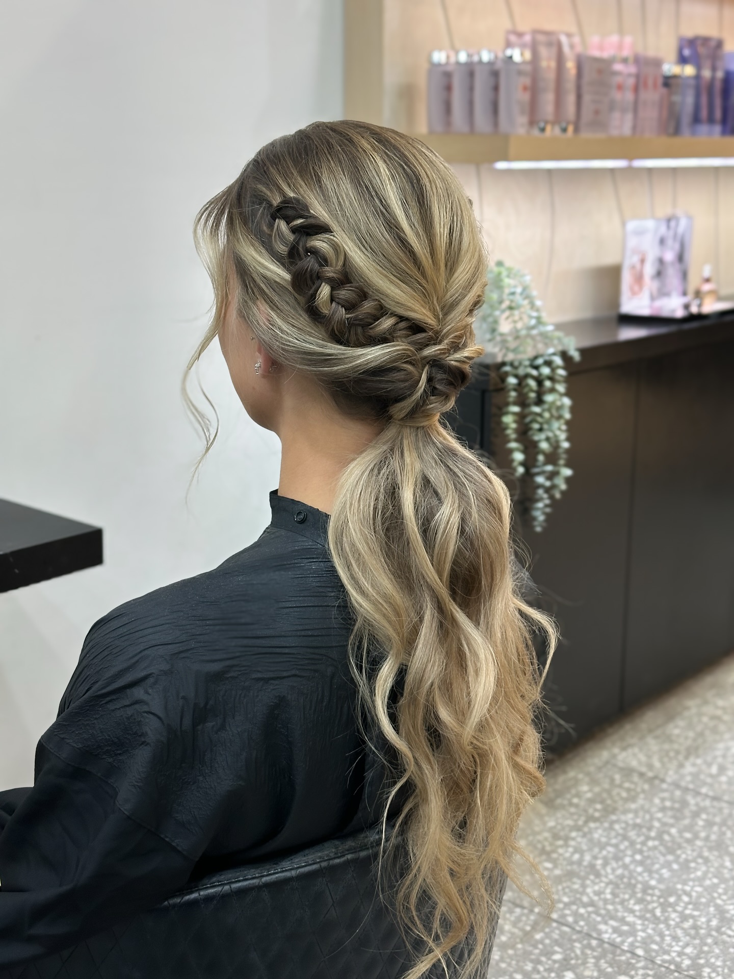 Elegant Braided Updo with Cascading Waves