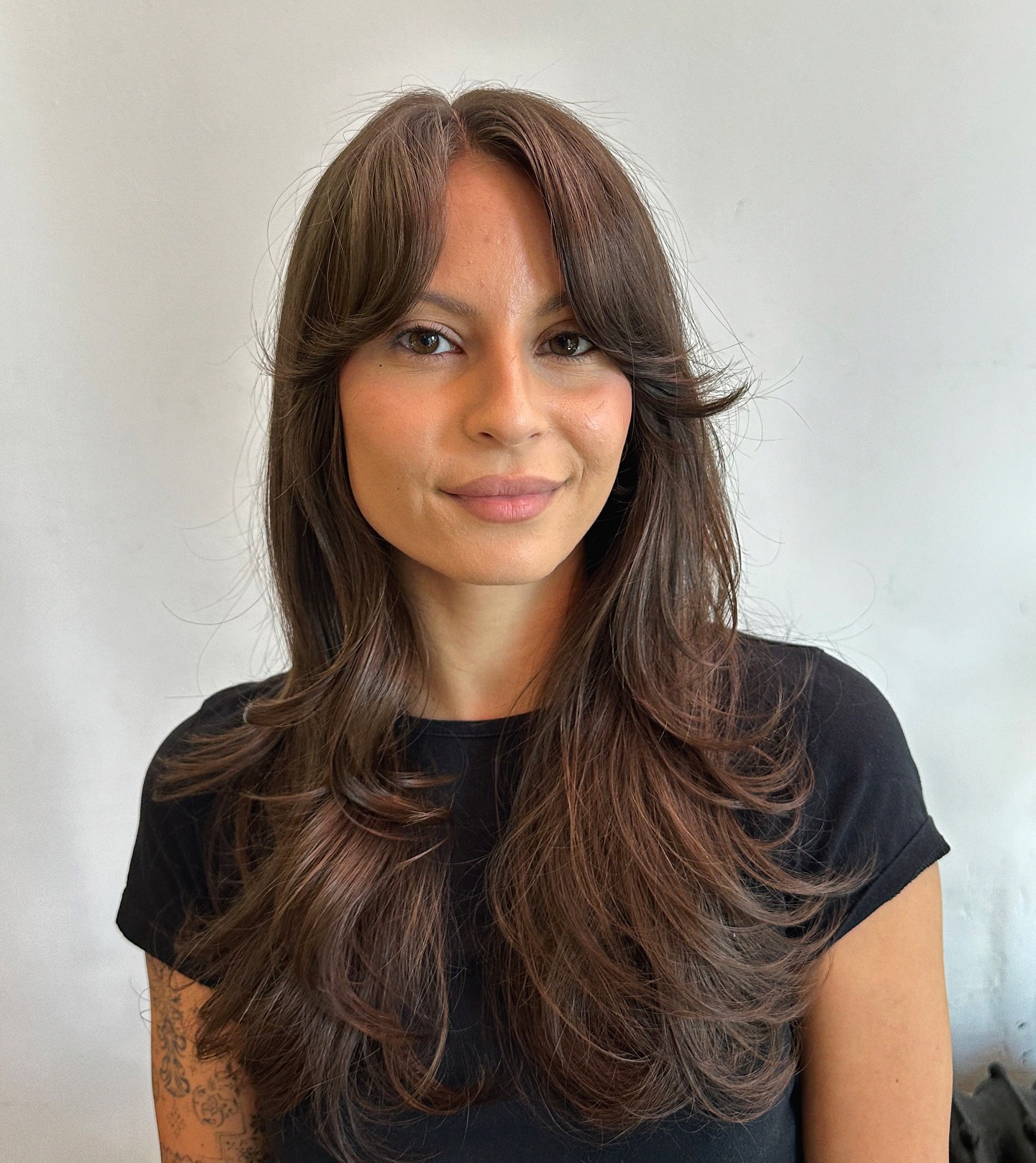 Rich Chestnut Layers with Feathered Bangs