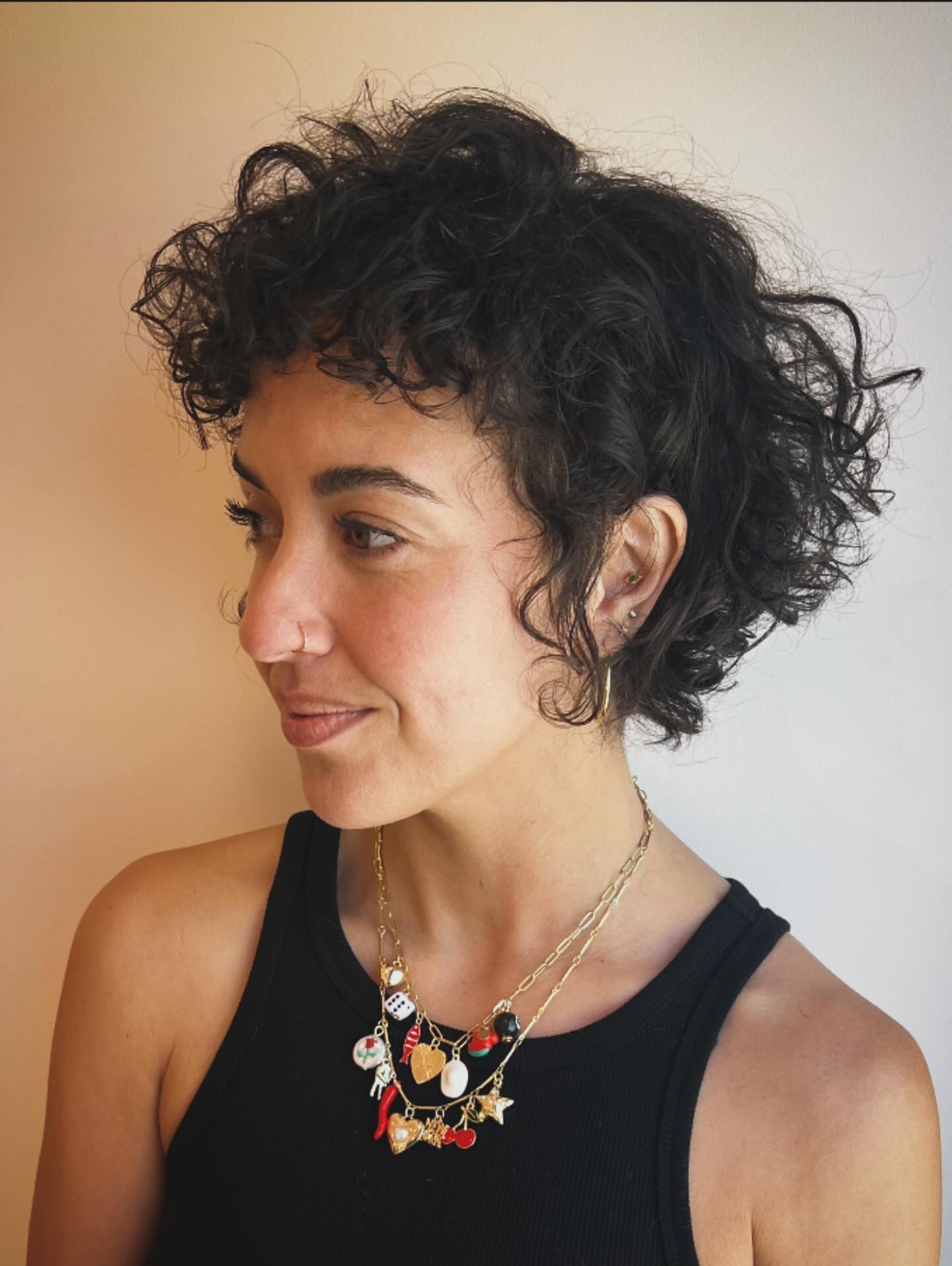 Softly Tousled Jet-Black Curly Bob