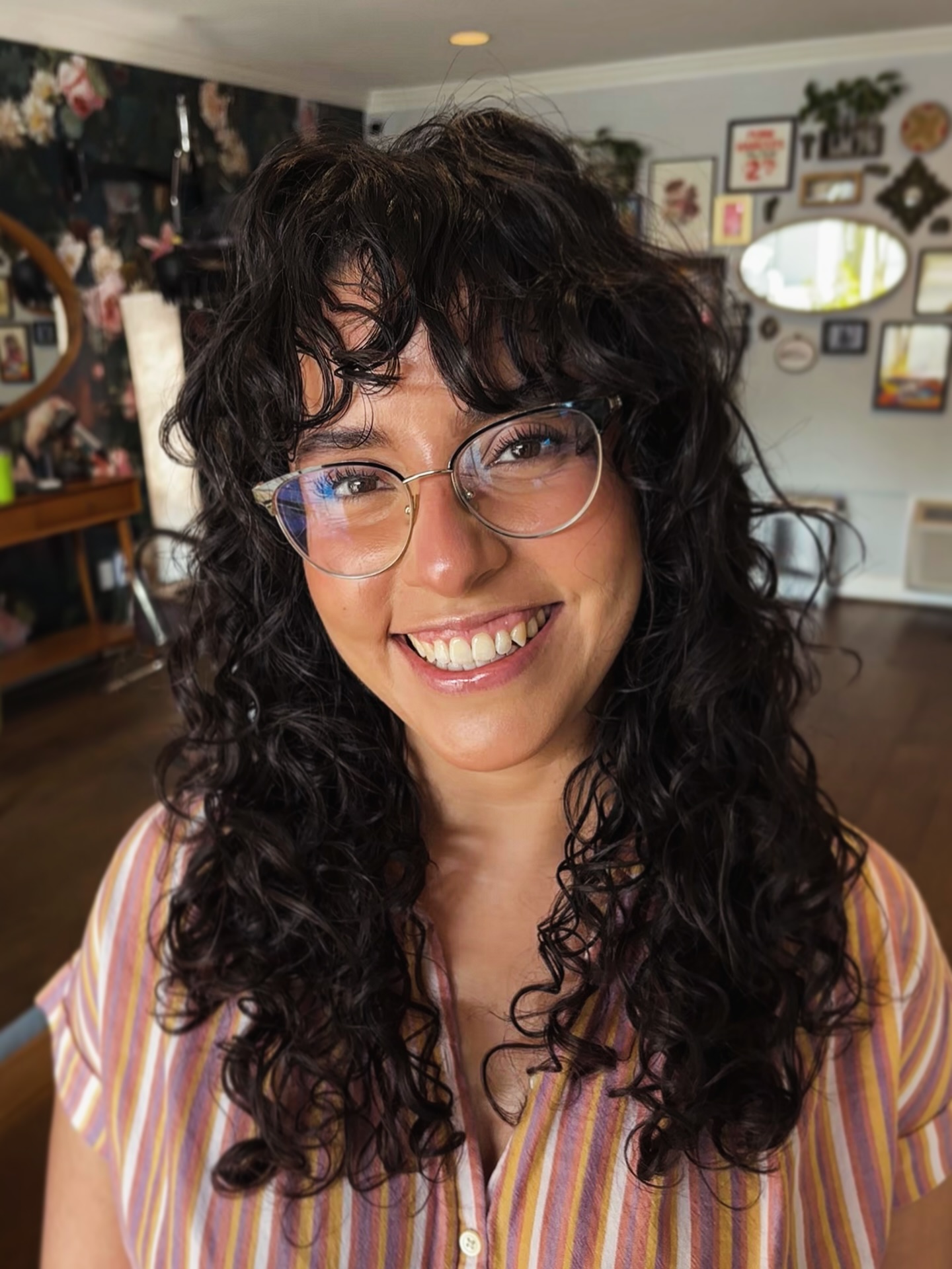 Stylish Curly Cut with Defined Bangs