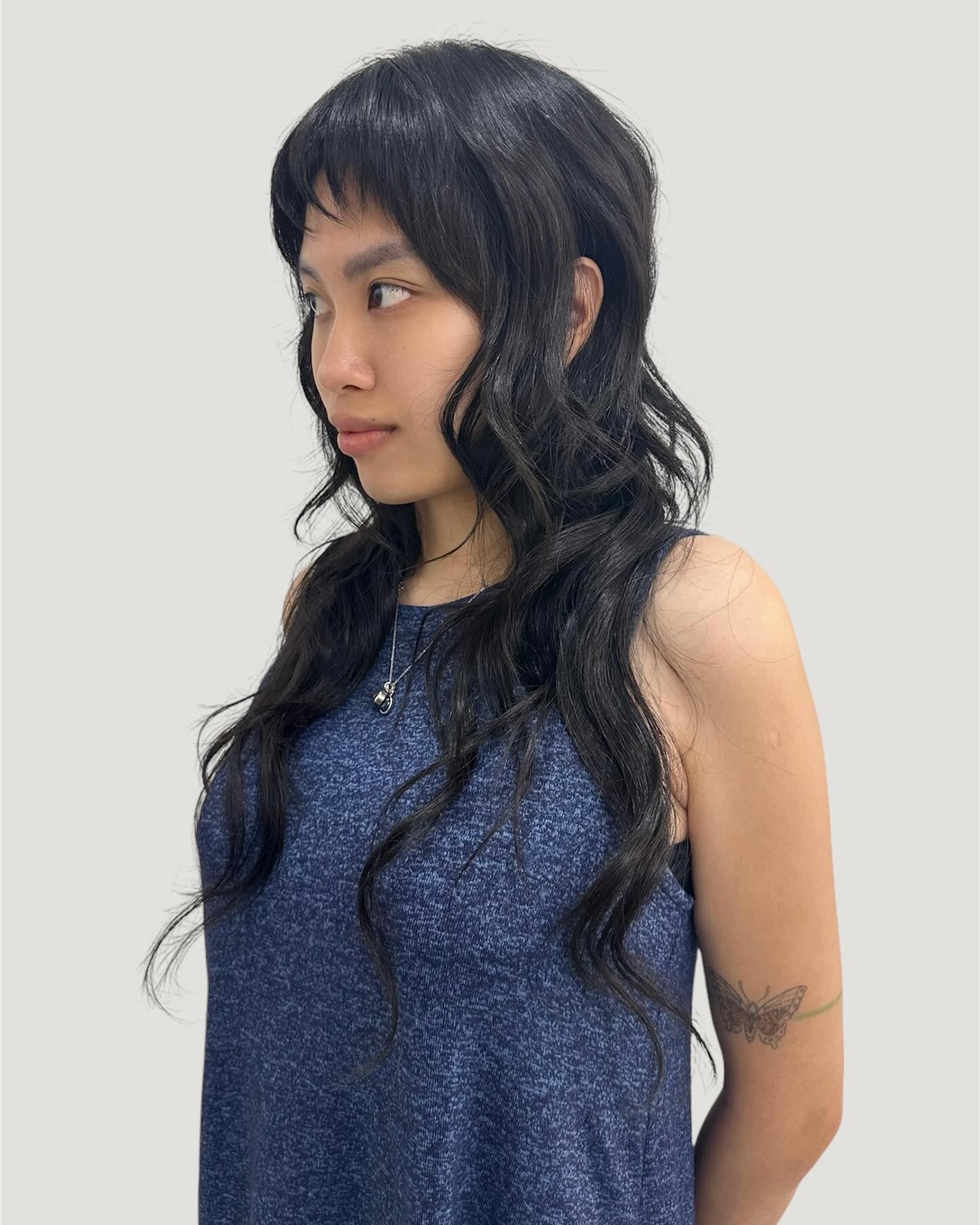 Textured Long Wolf Cut with Chic Bangs