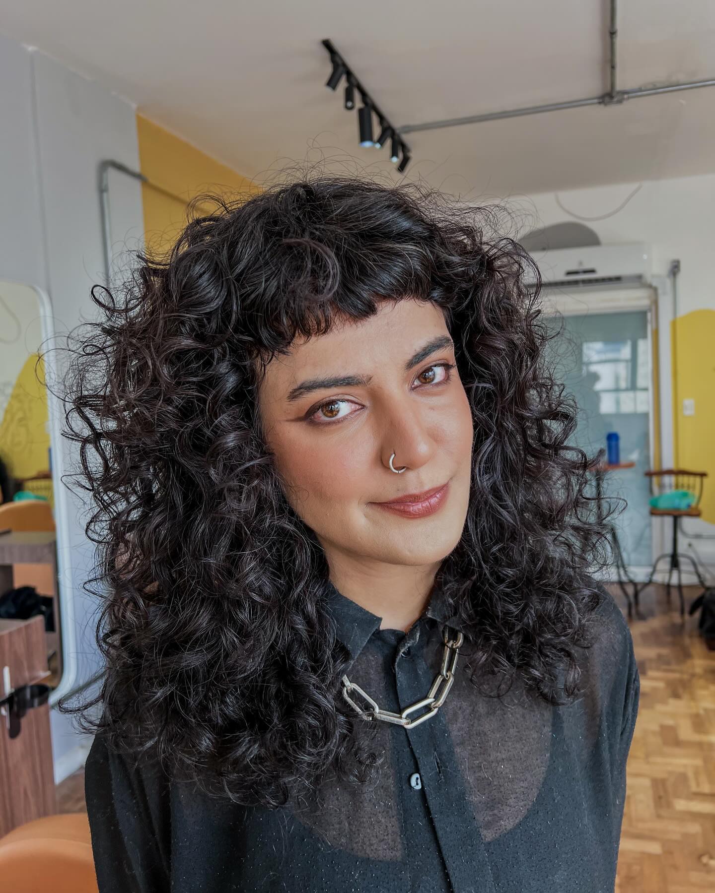 Textured Mid-Length Curls with Soft Fringe