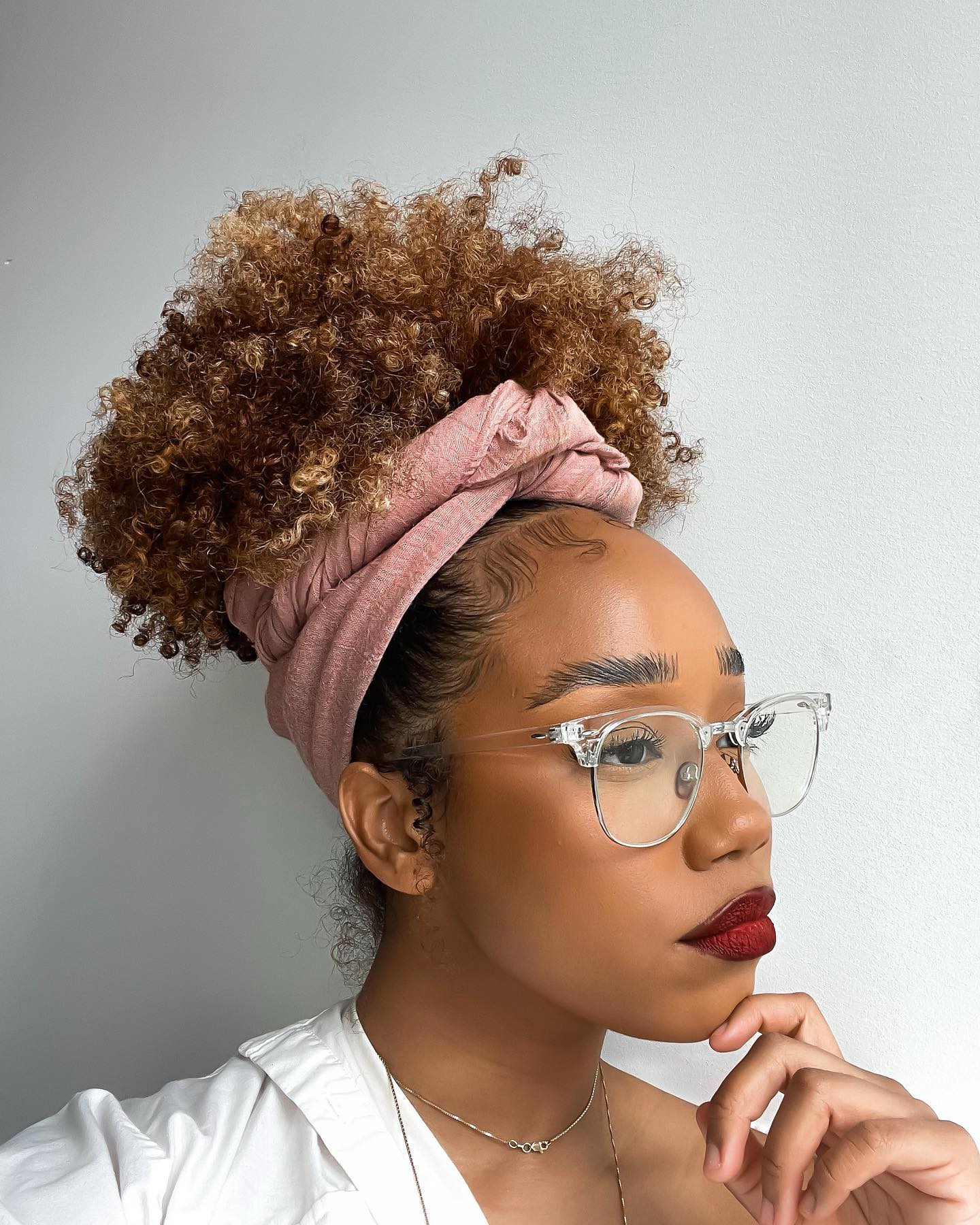 Voluminous Curly High Puff with Defined Curls