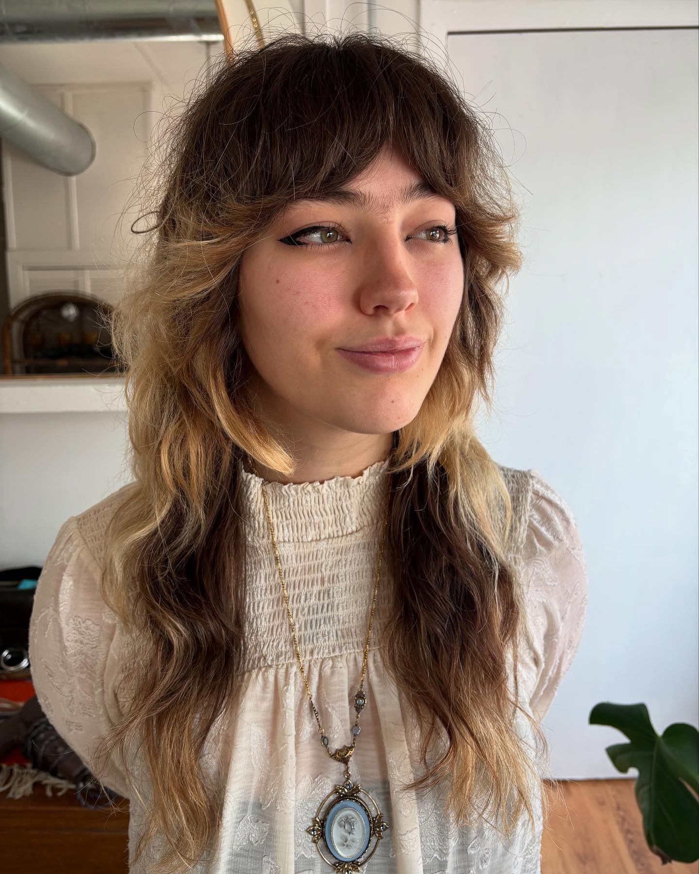 Whimsical Textured Shag with Bold Bangs