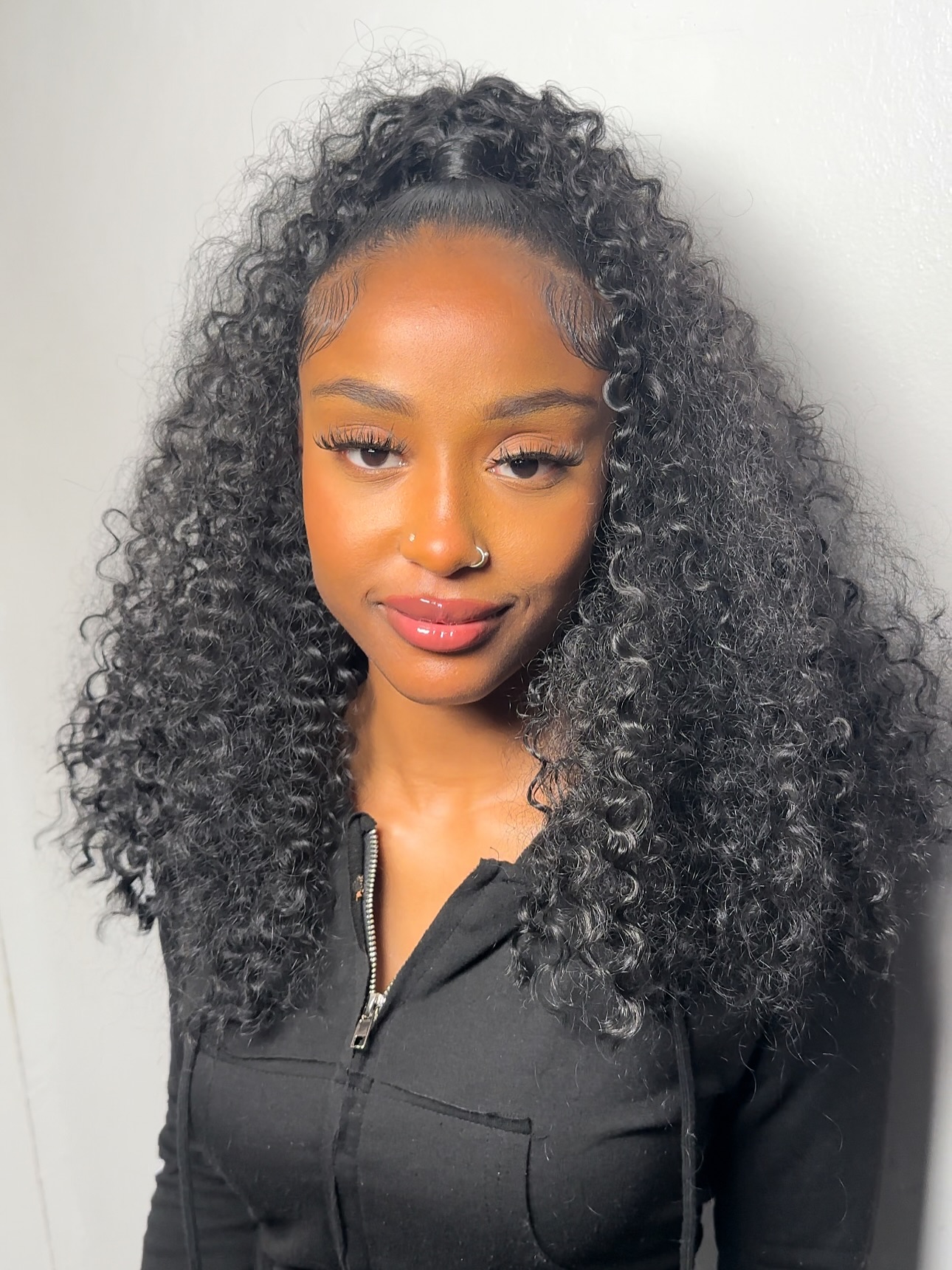 Chic Curly Half-Up Swoop with Defined Texture