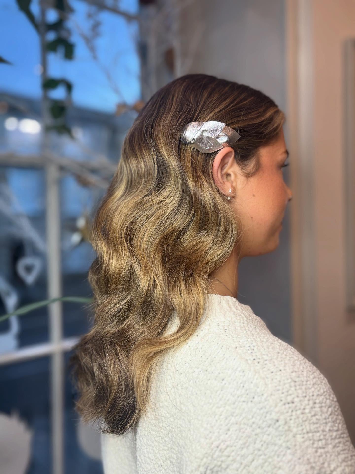 Elegant Soft Waves with Silver Hair Clip Accent