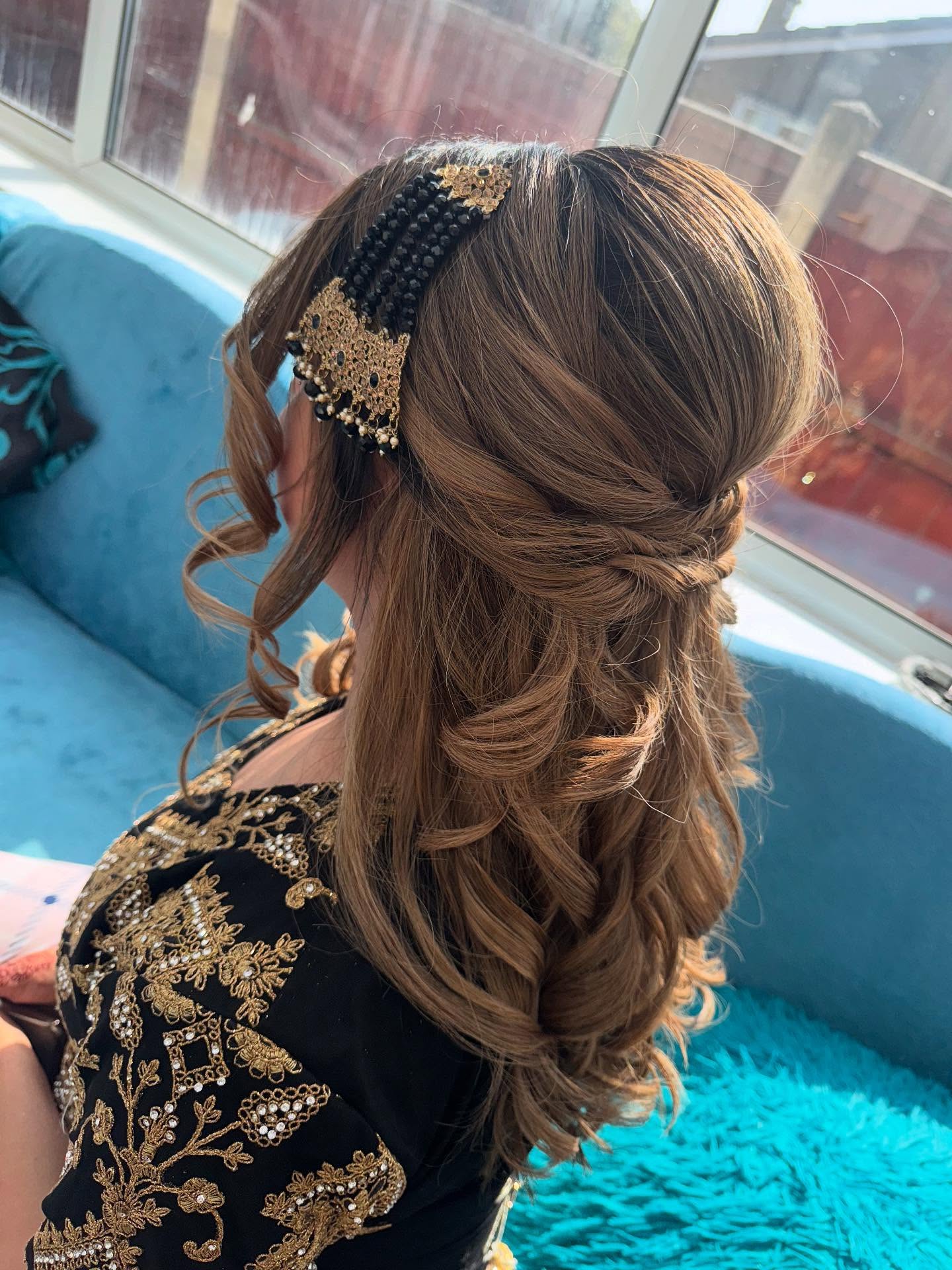 Elegant Twisted Half-Updo with Beaded Accessory