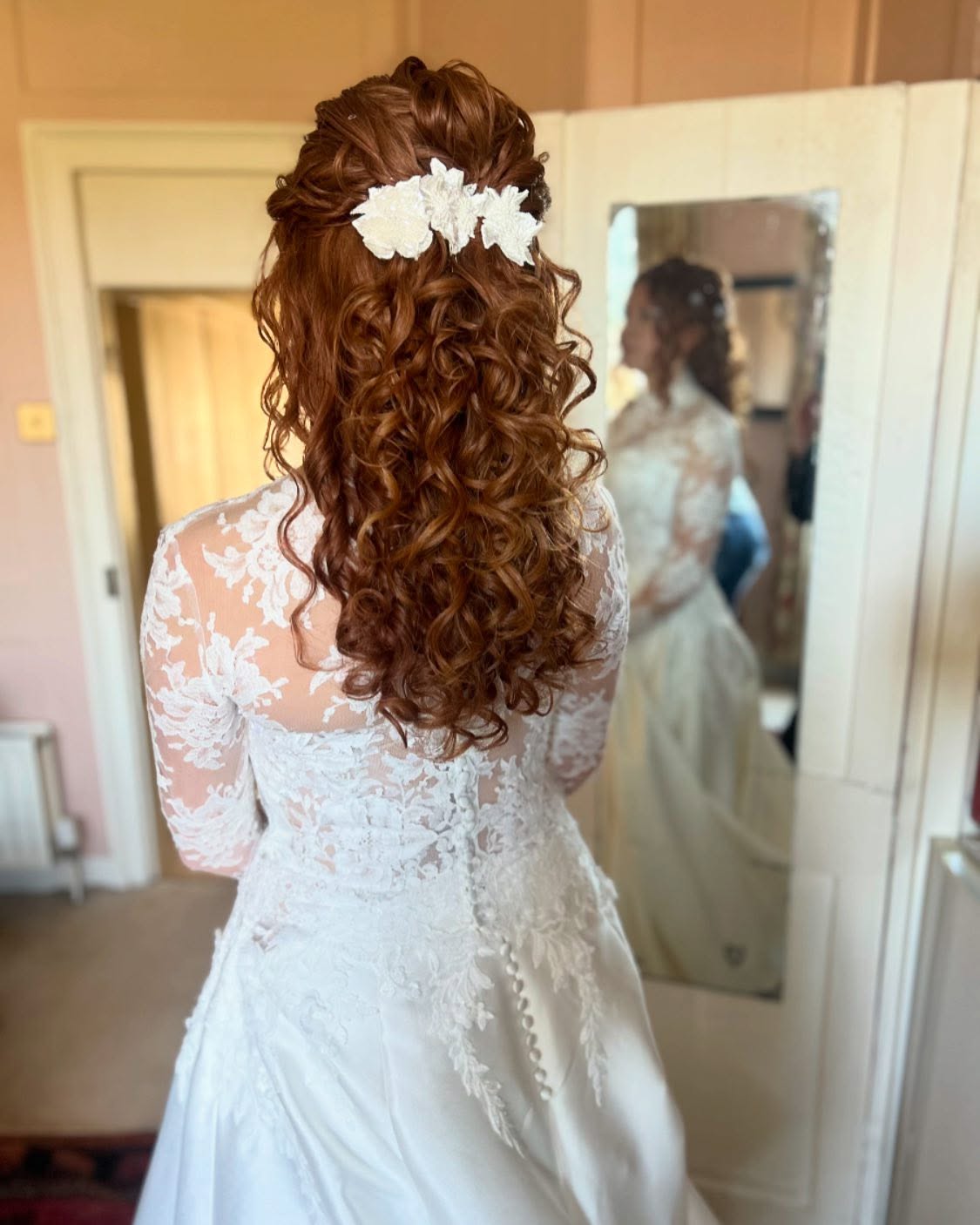 Enchanting Curly Half-Up Bouquet with Lace Accents