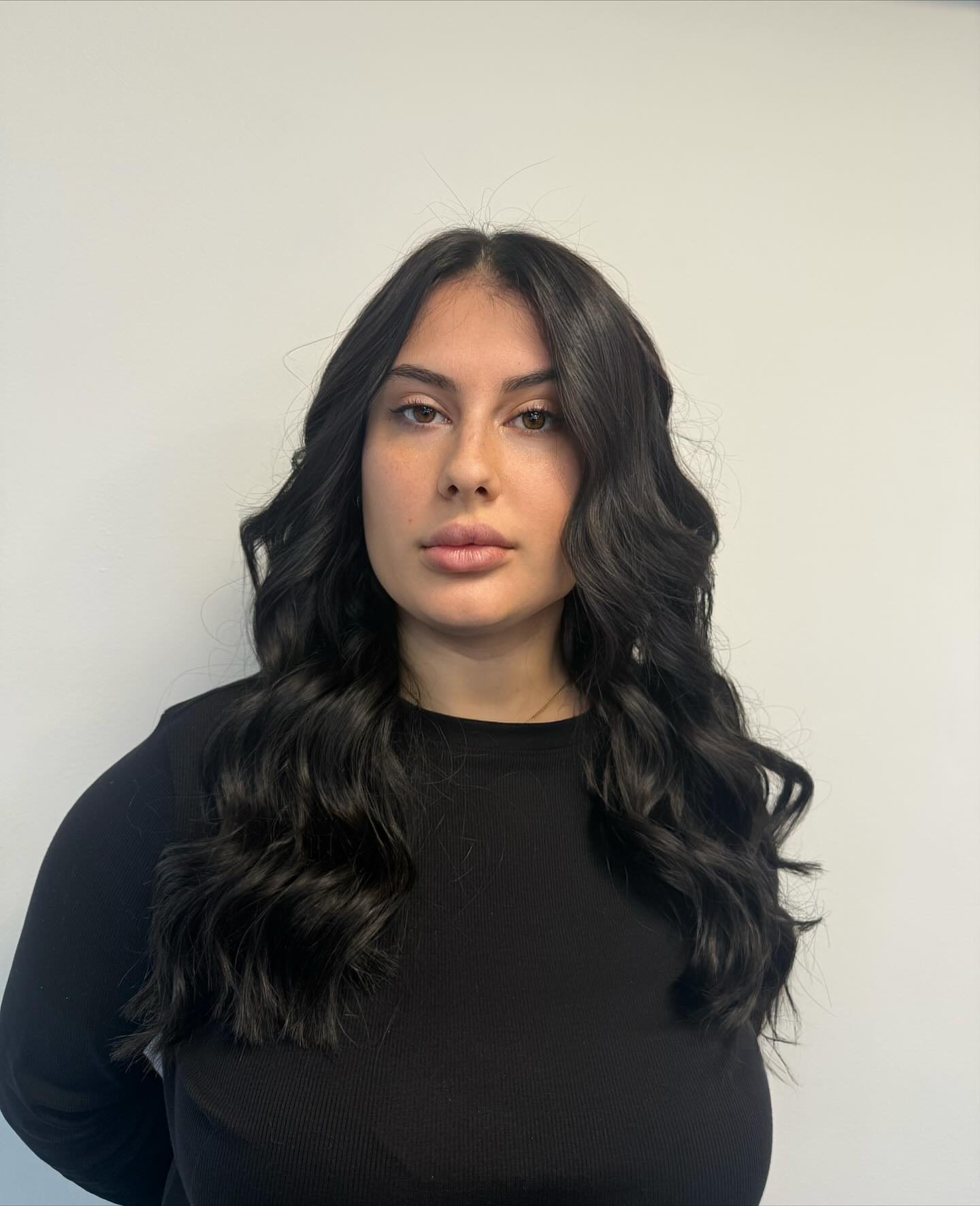 Luxurious Deep Black Waves with Voluminous Layers