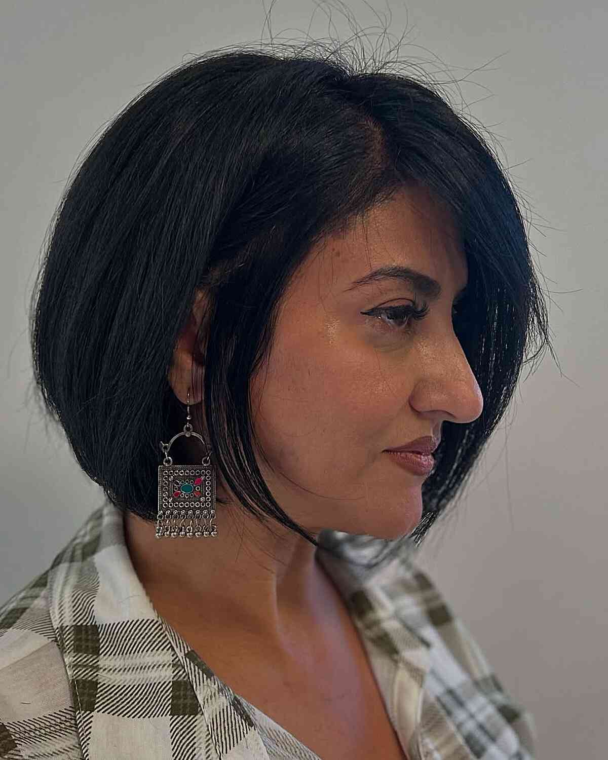 Modern Angular Bob with Side-Swept Bangs