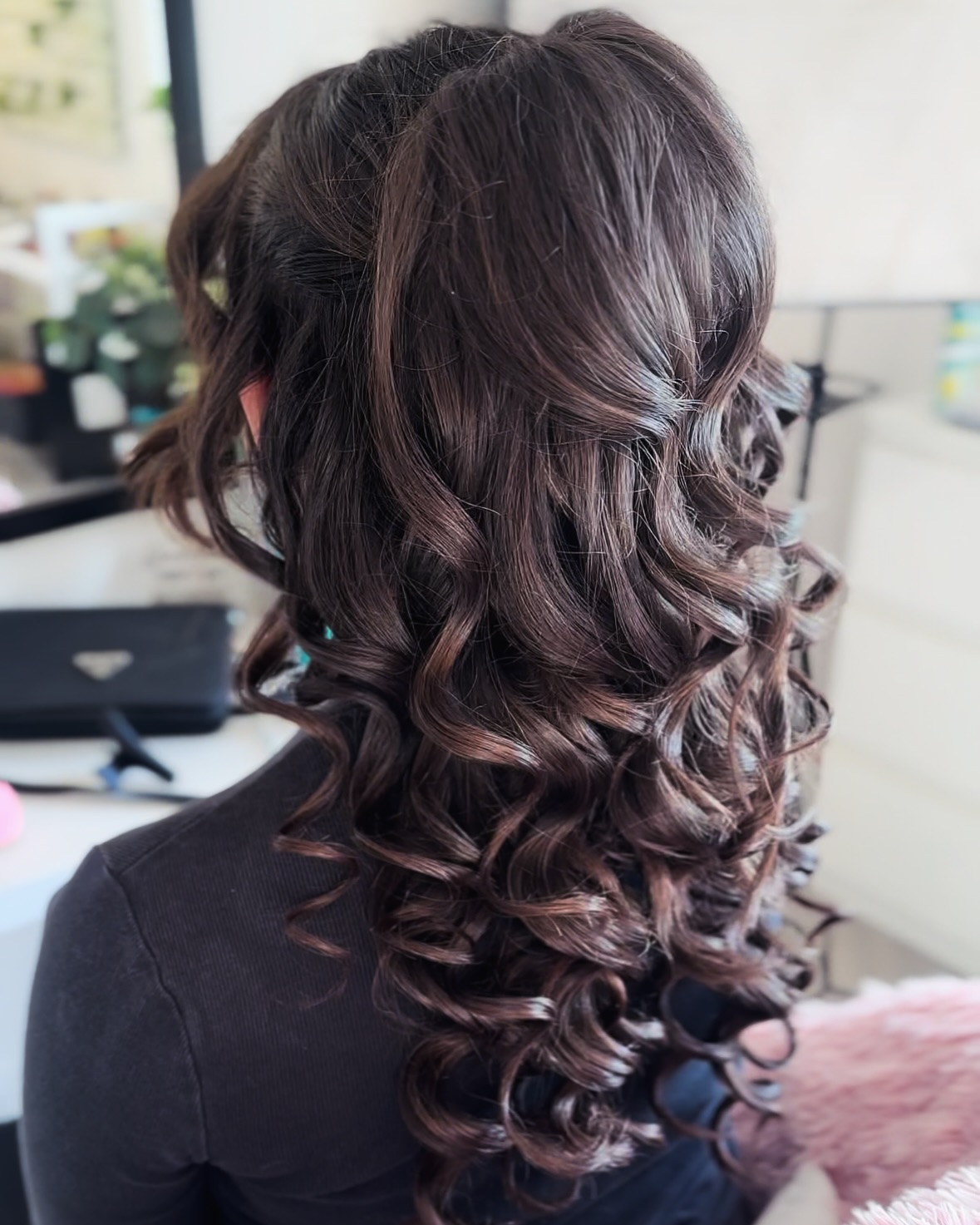 Rich Chestnut Curls Gathered with Relaxed Elegance