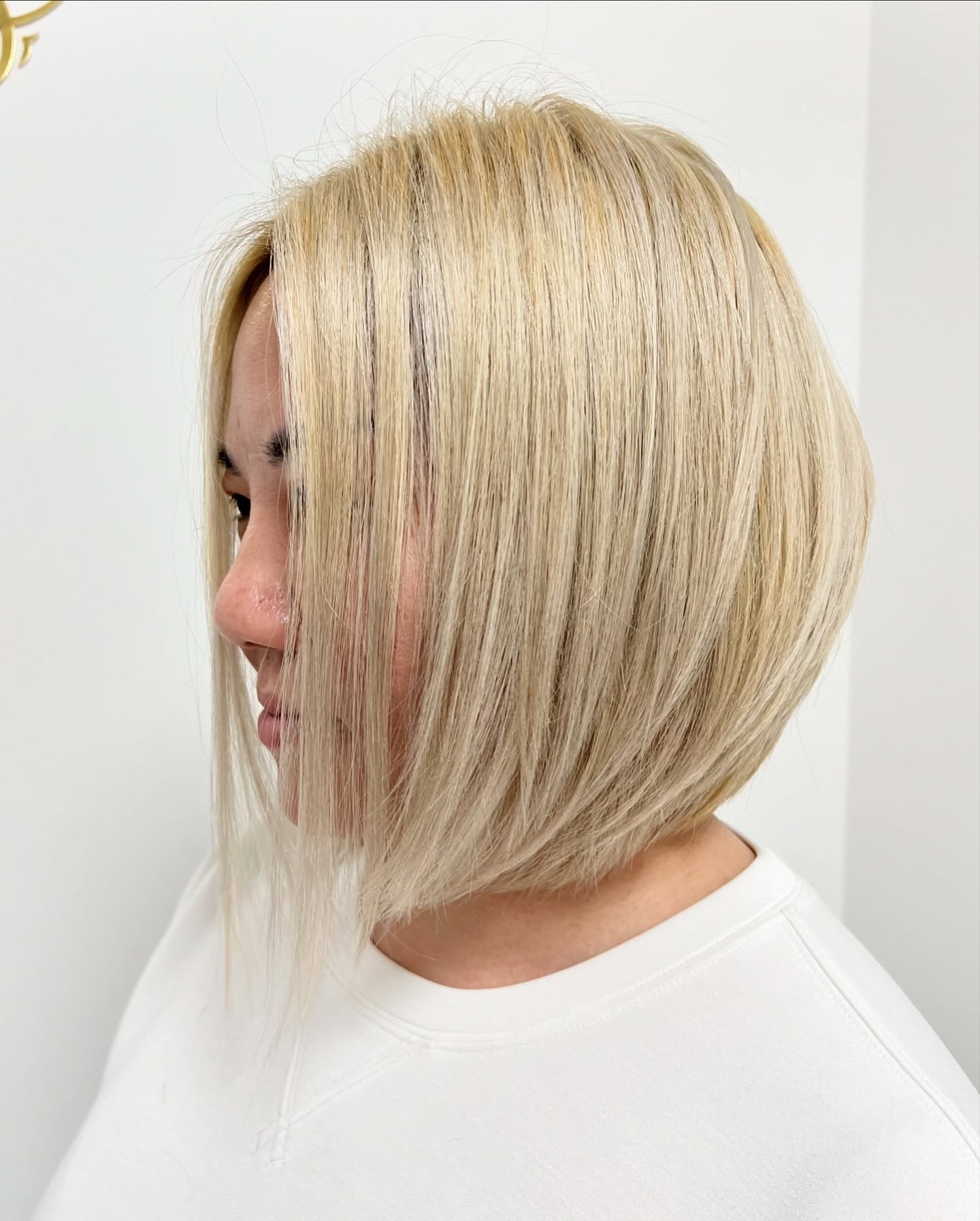Sleek Blonde Bob with Dark Roots