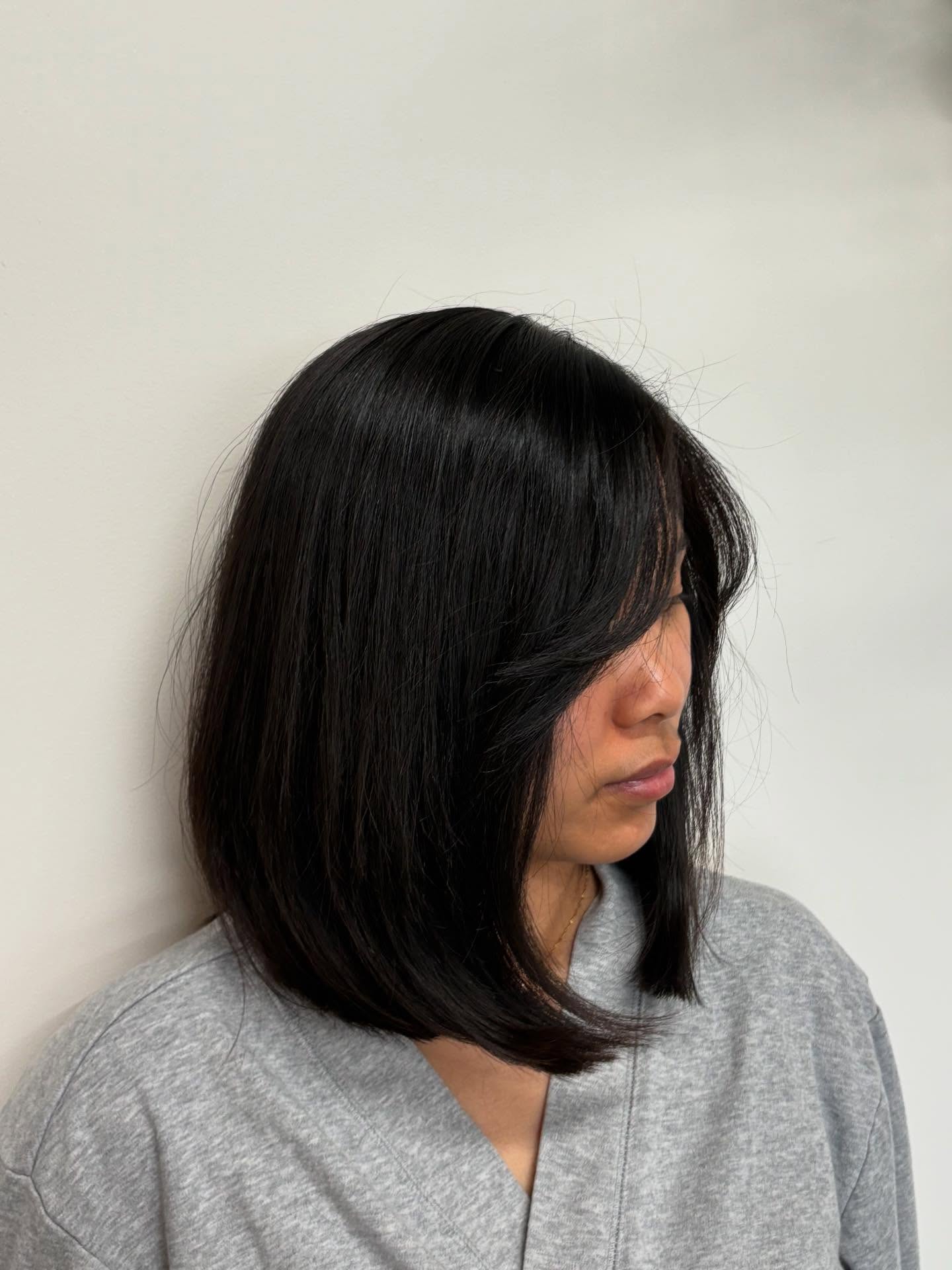 Sleek Midnight Black Shoulder Cut with Subtle Angling