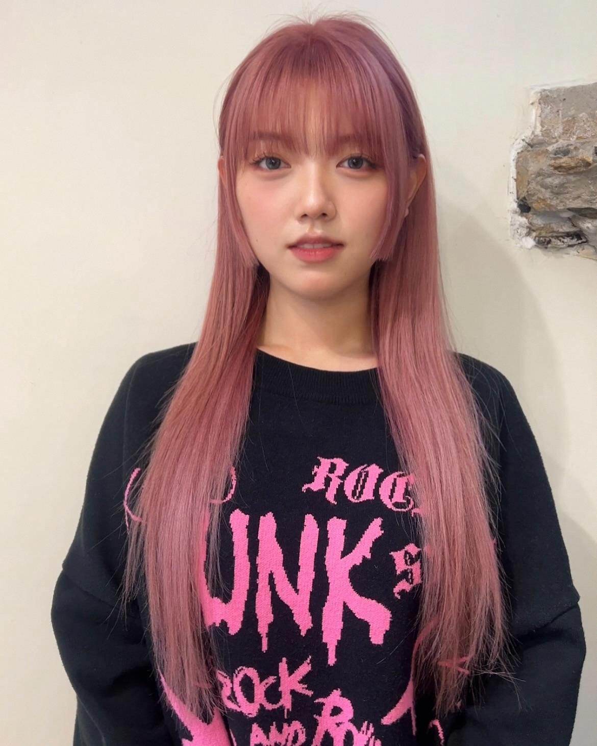 Soft Pink Long Layers with Face-Framing Fringe