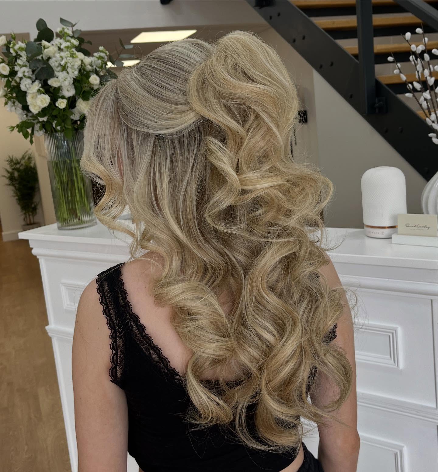 Sublime Platinum Blonde Waves with Relaxed Half-Up Style