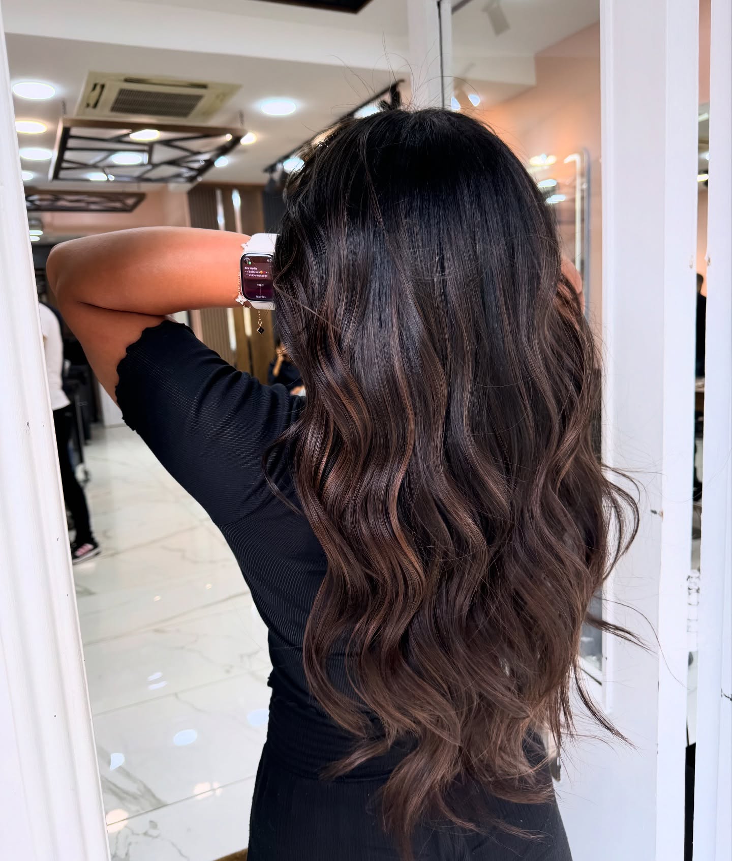 Wavy Dark Brown Hair with Subtle Highlights
