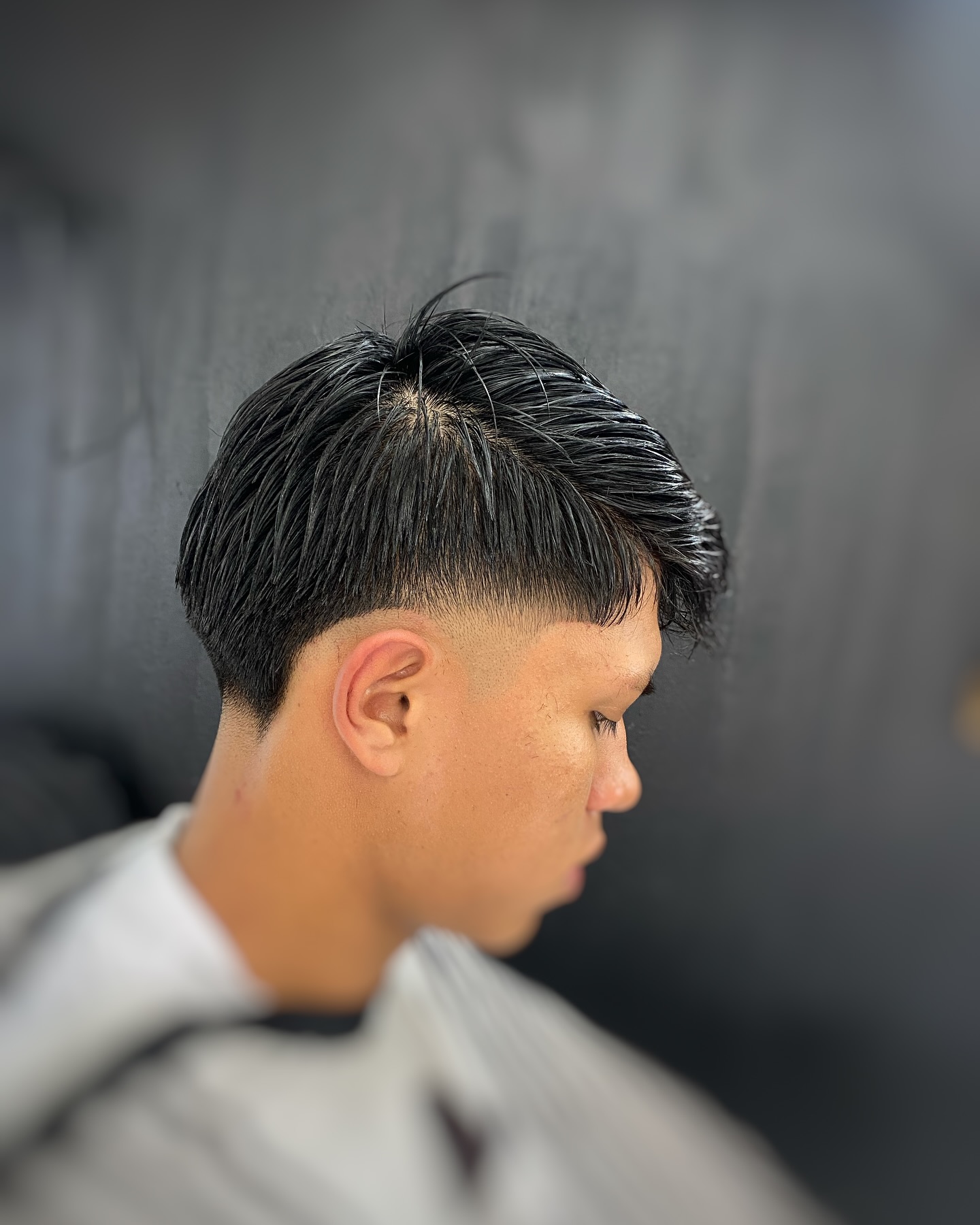 Sleek Modern Mid Taper Fade with Textured Top